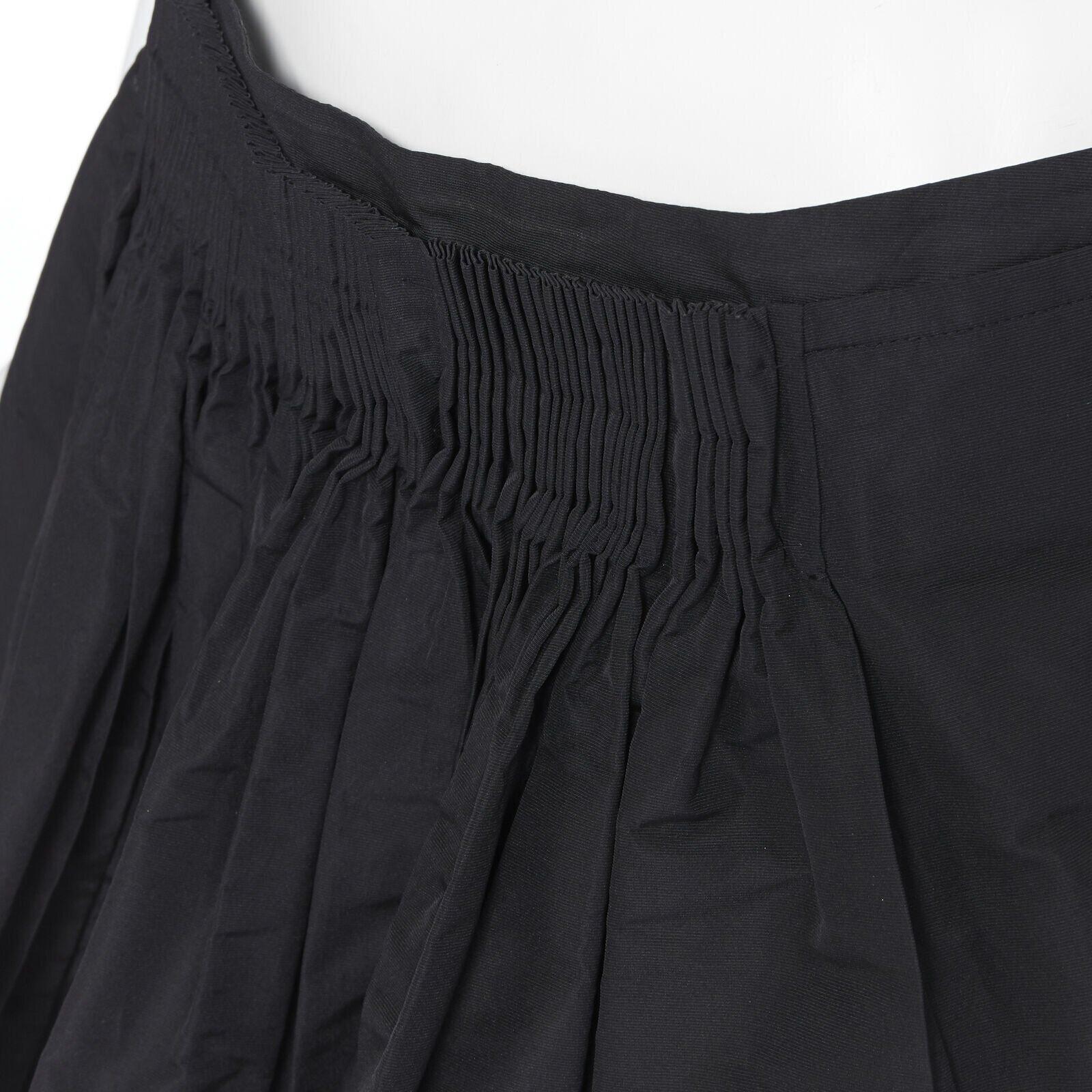 vintage MIU MIU polyester acetate pleated dual slit pocket flared skirt IT40
Reference: CEWG/A00028
Brand: Miu Miu
Designer: Miuccia Prada
Model: 