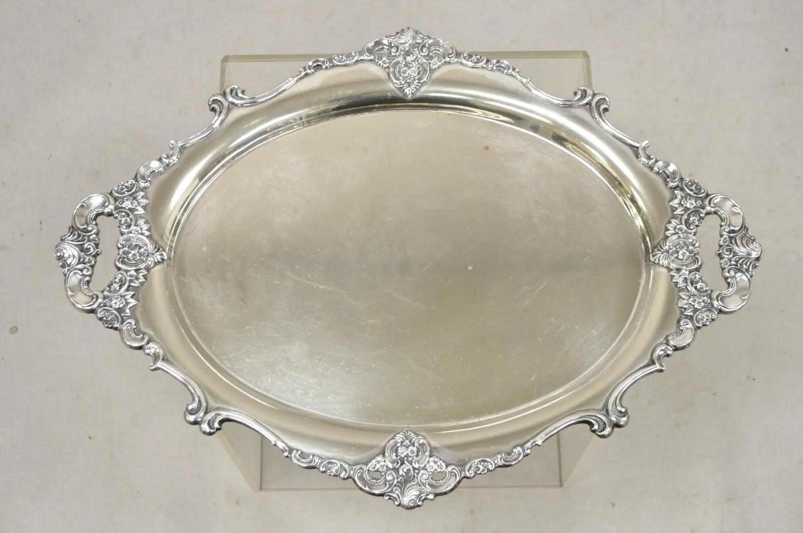 Vintage Miyata (Japan) English Victorian Style Silver Plated Oval Floral Repousse Platter Tray. Circa Late 20th Century.
Measurements: 1
