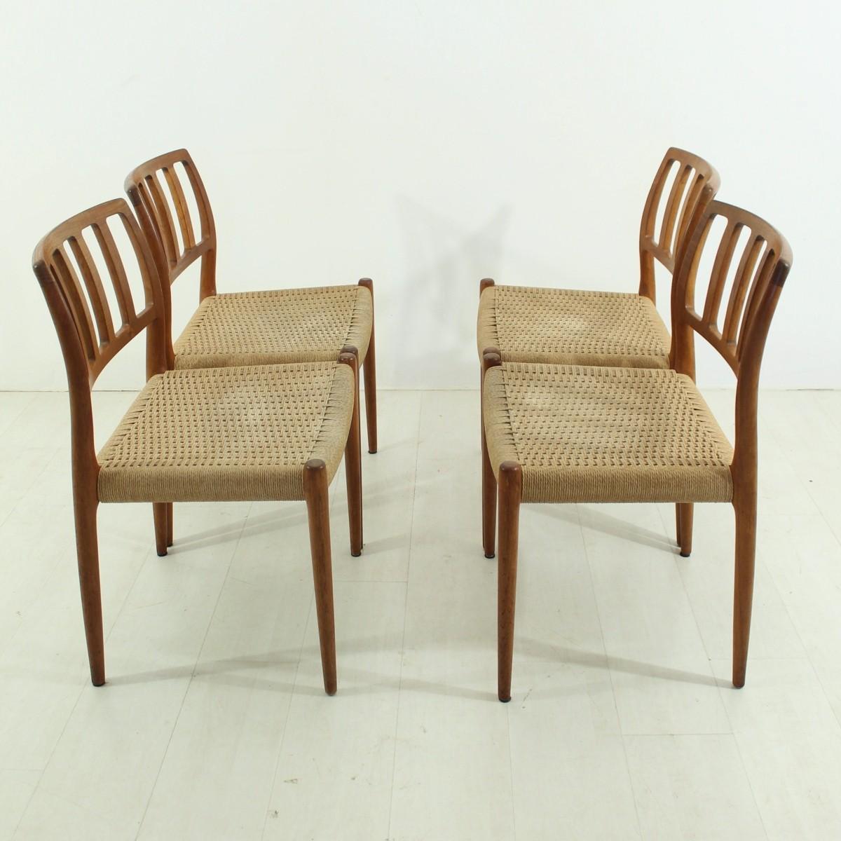 This set of four chairs are model 83 and were produced by J.L. Møllers.