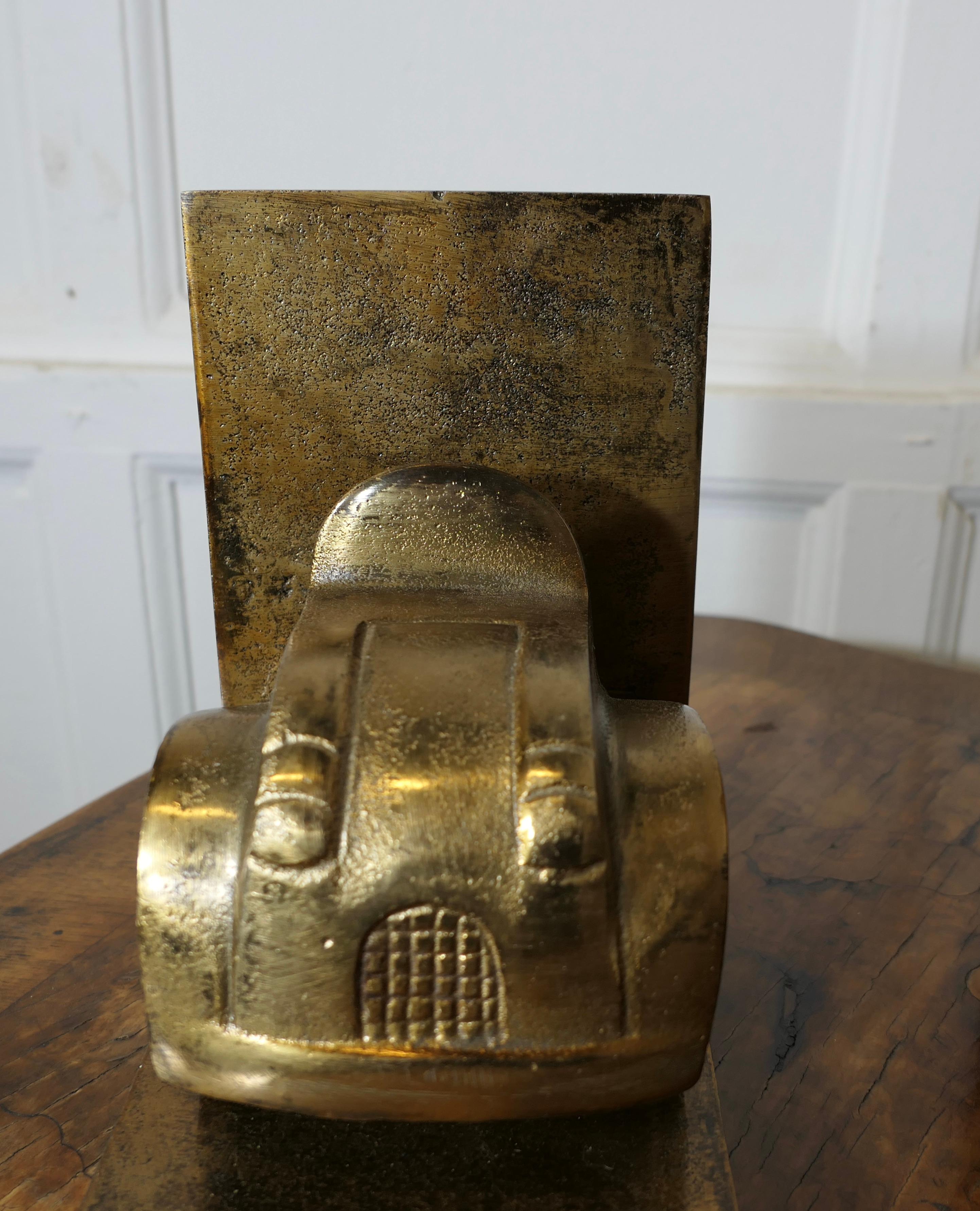 Modello di auto d'epoca una coppia di fermalibri in ottone    Un set molto attraente in vendita 2
