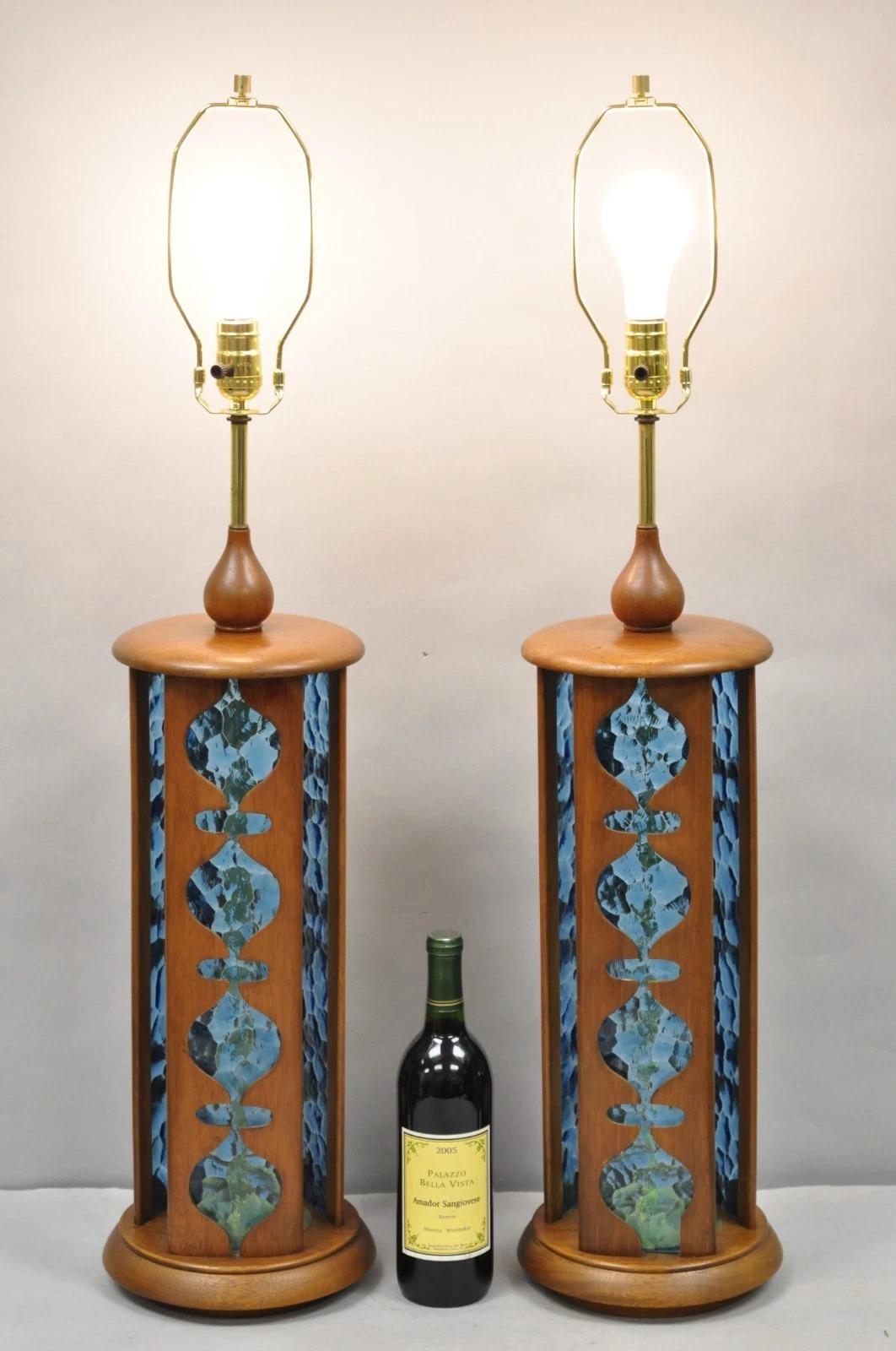 Vintage Mid Century Modern Sculpted Walnut & Brass, Blue Stained Glass Table Lamps by Modeline - a Pair. Circa Mid 20th Century. Measurements: 37.5