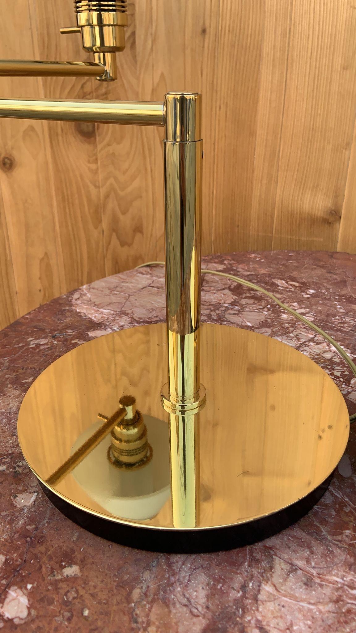 Vintage Modern Brass Swing Arm Reading Table Lamp with Glass Shades - Pair 

A vintage modern pair of reading table lamps made of brass with frosted glass shades. Very well made, heavy and with dimmers. Great for reading! 

Circa 2000’s

Dimensions
