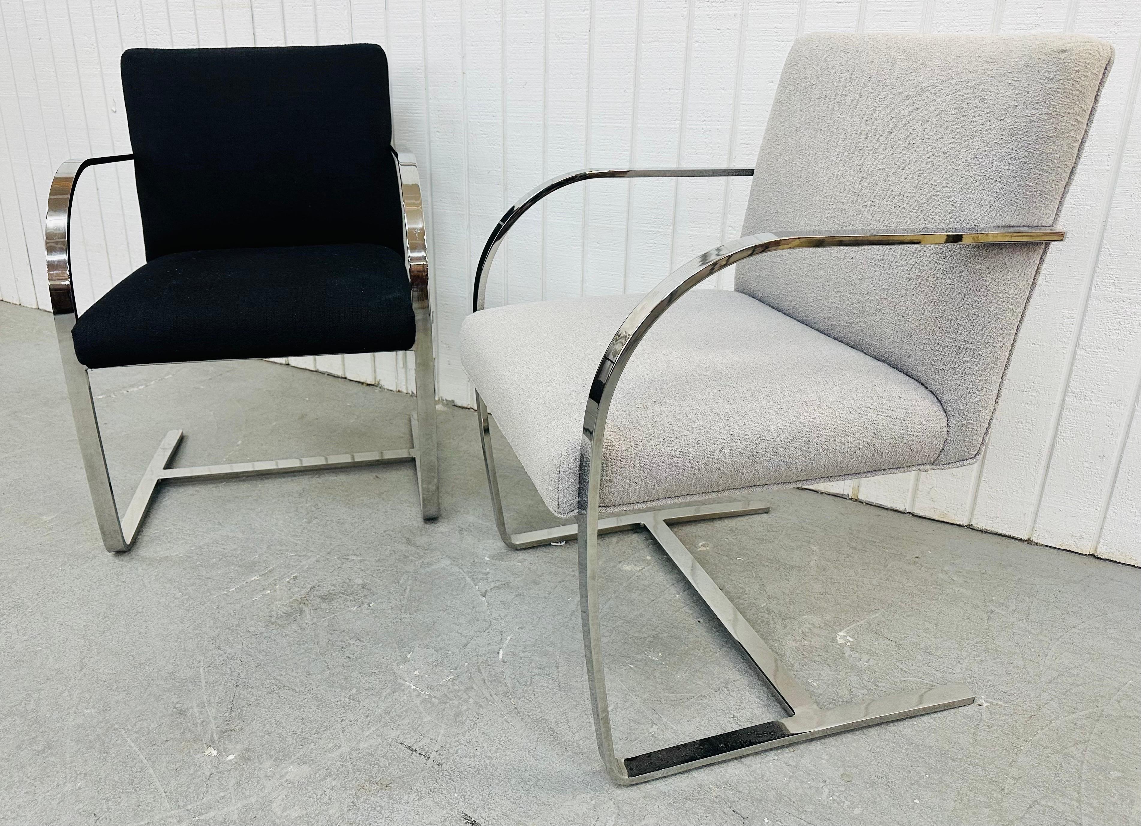 This listing is for a pair of Vintage Modern Bruno Chrome Arm Chairs. Featuring a Bruno style design, flat bar chrome frames, and black/gray upholstery body. This is an exceptional combination of quality and design!