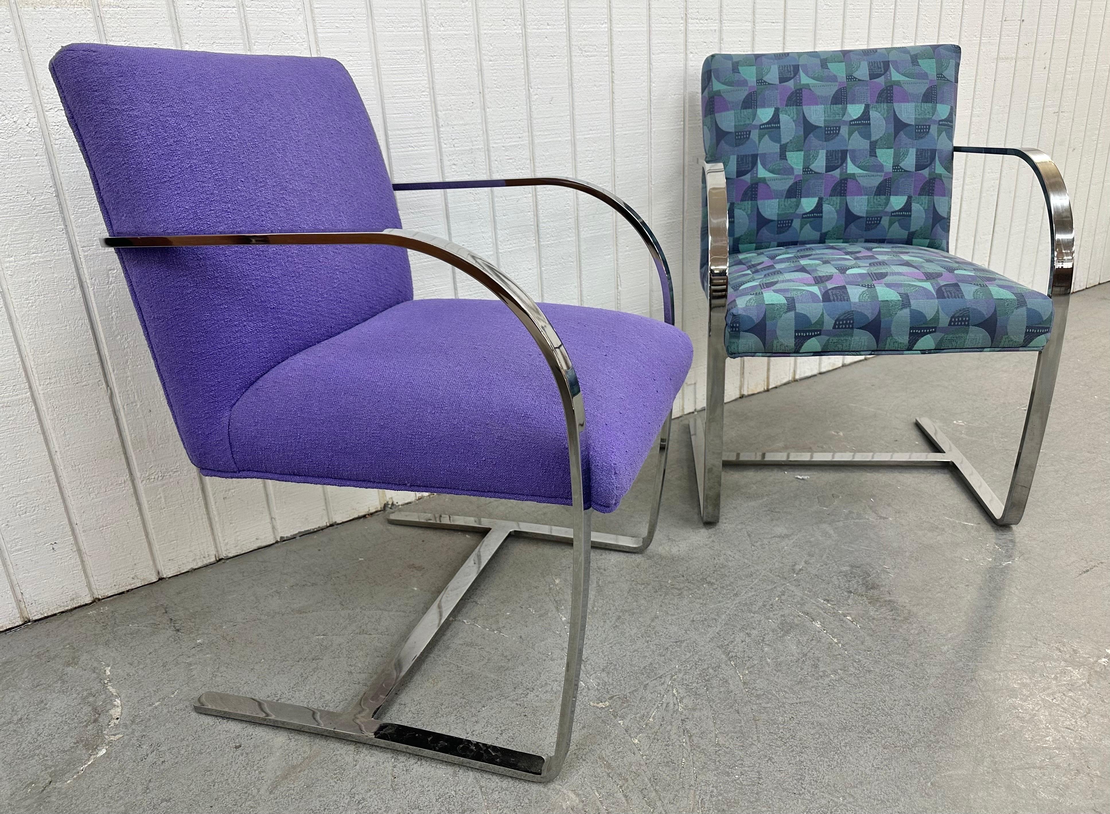This listing is for a pair of Vintage Modern Bruno Chrome Arm Chairs. Featuring a Bruno style design, flat bar chrome frames, and purple/geometrical upholstered body. This is an exceptional combination of quality and design!