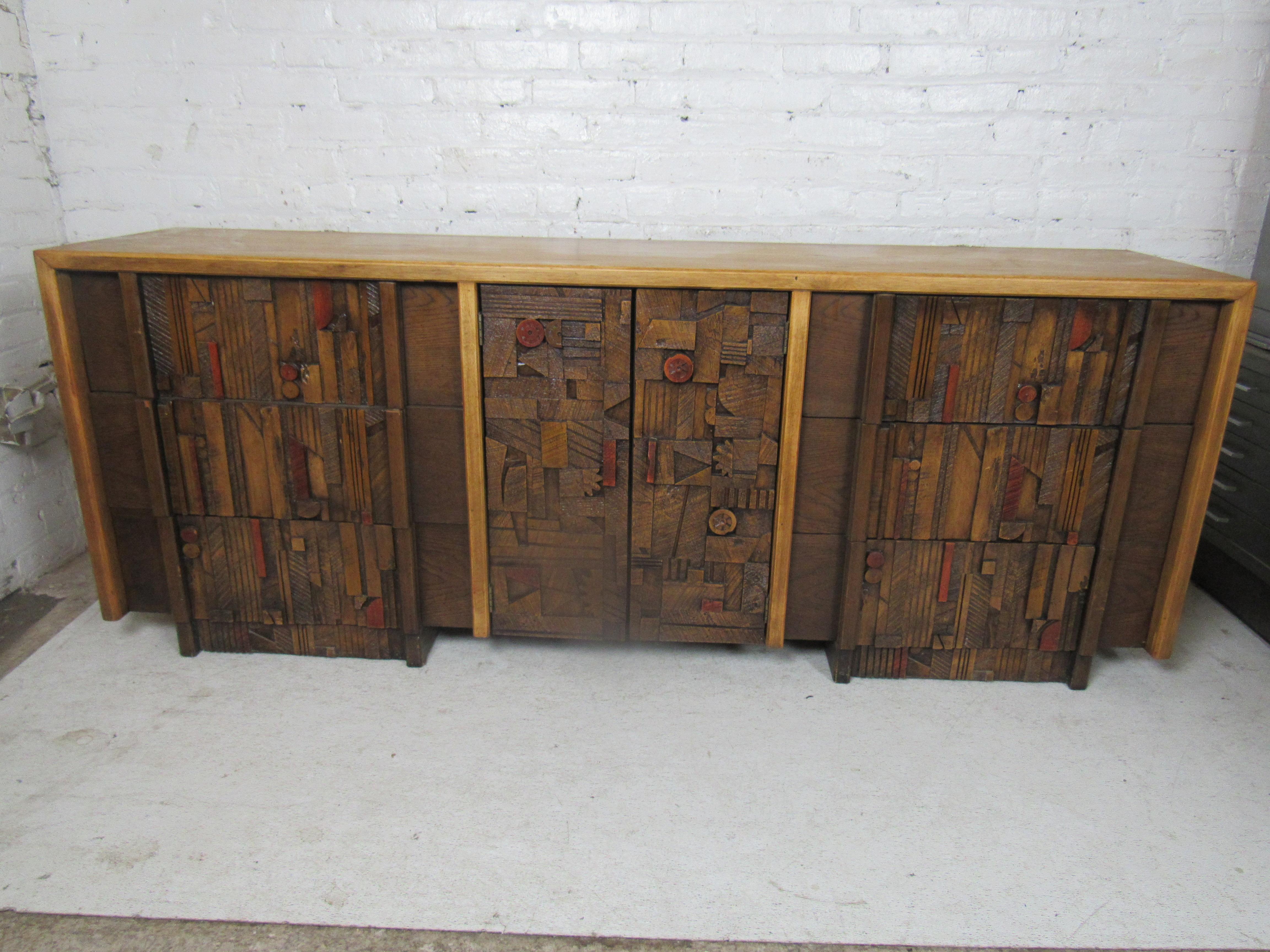 Mid-Century Modern Brutalist nine-drawer dresser by Lane features a sculpted Brutalist front.
The dresser would make a great addition to any home.

Please confirm item location NY or NJ with dealer.
