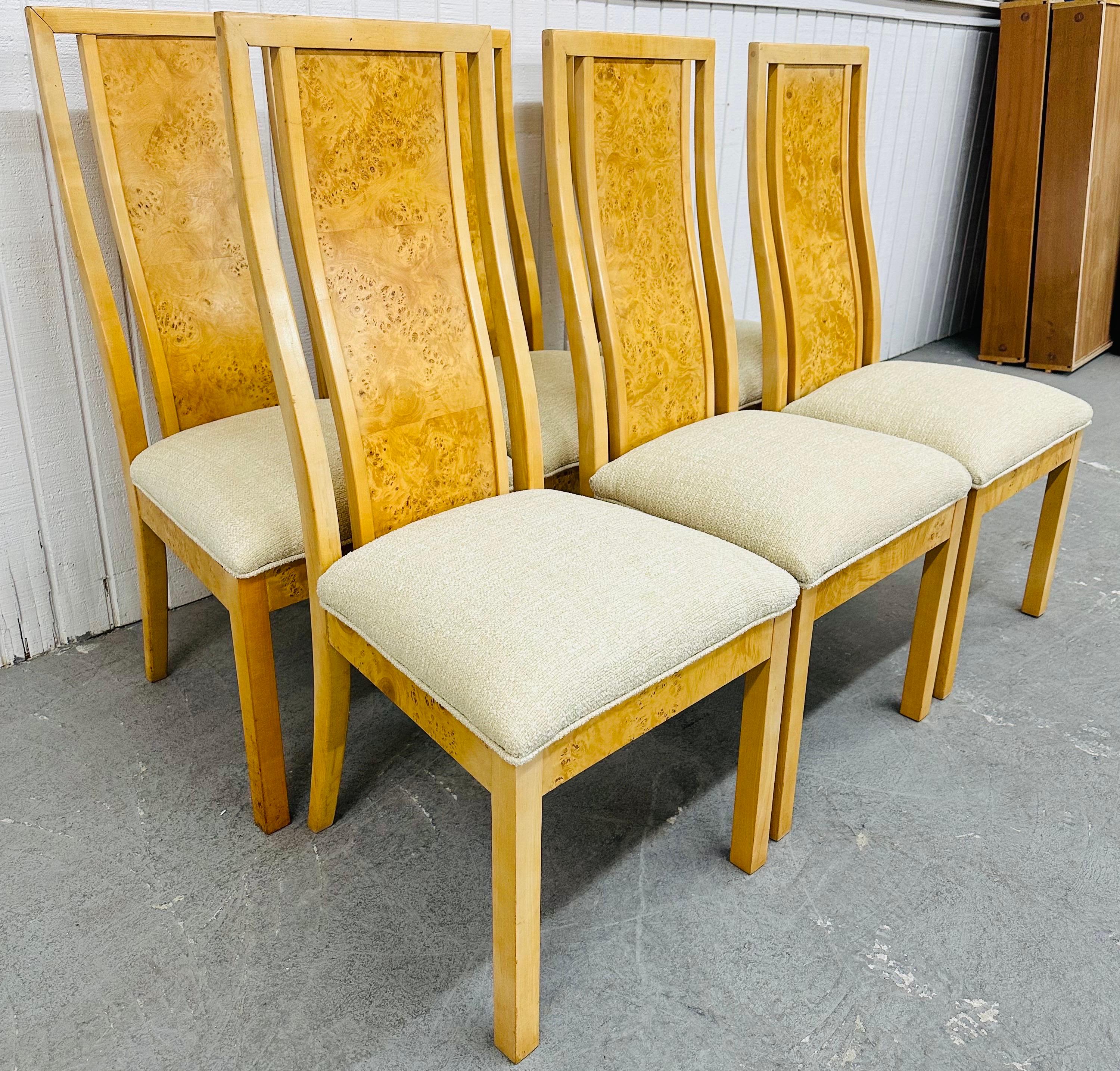 This listing is for a set of six Vintage Modern Burled Wood Dining Chairs. Featuring six side chairs, burled wood frames, and newly upholstered seats. This is an exceptional combination of quality and design!