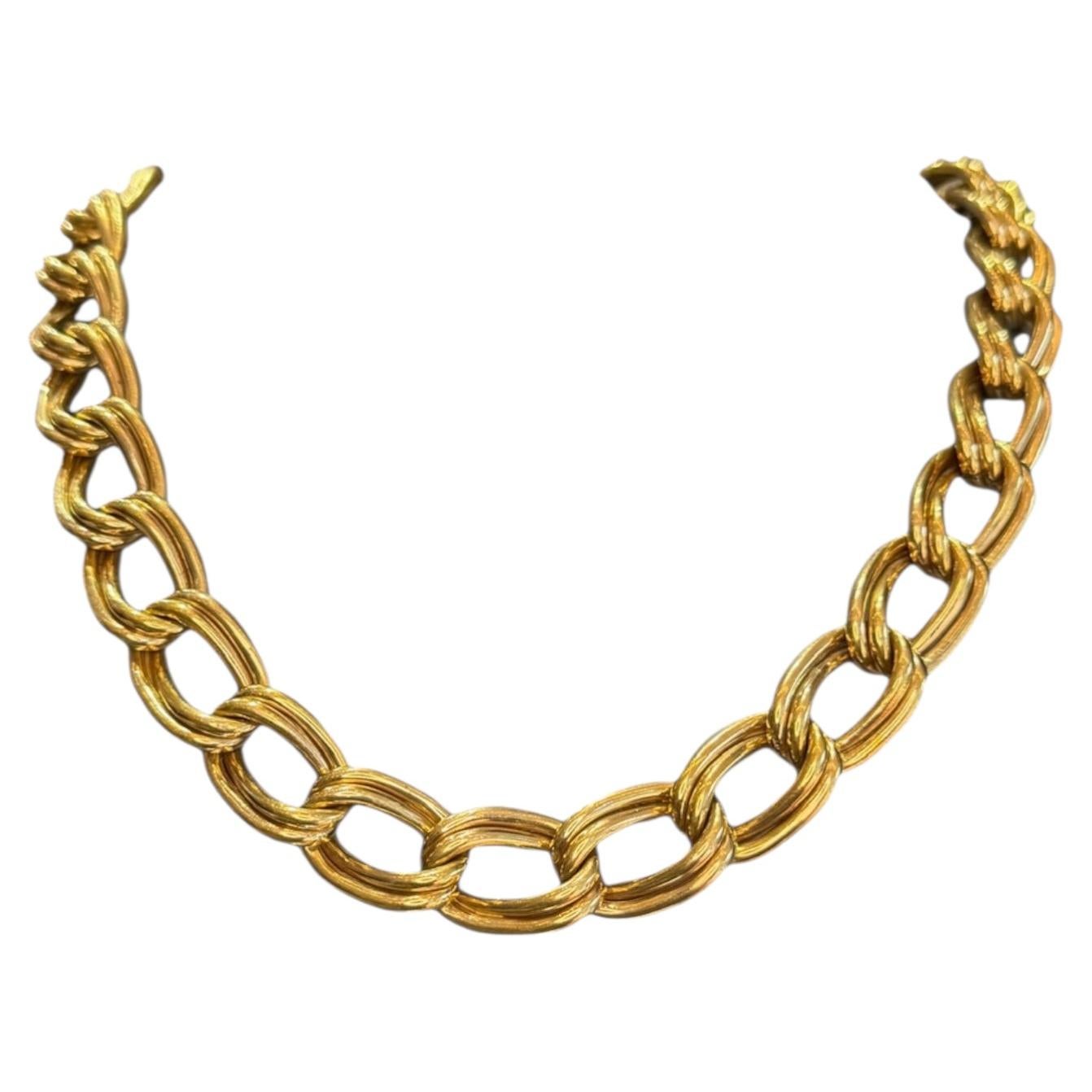 Collana a maglie ovali in oro giallo massiccio 14 carati, vintage e moderna, degli anni '60 circa.