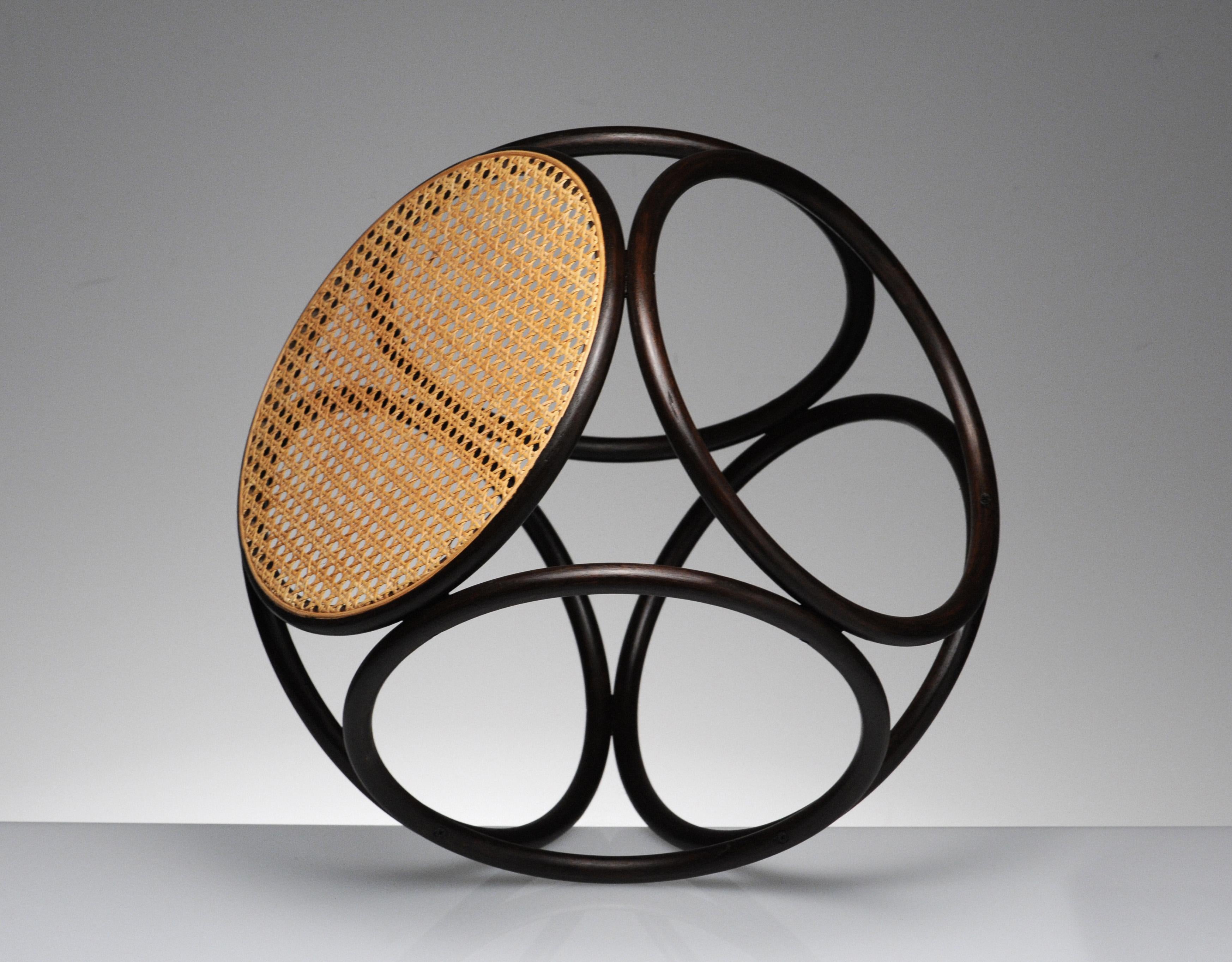 Sculptural bentwood stool by Thonet. Great versatile style, can be used as small side table as well.
  