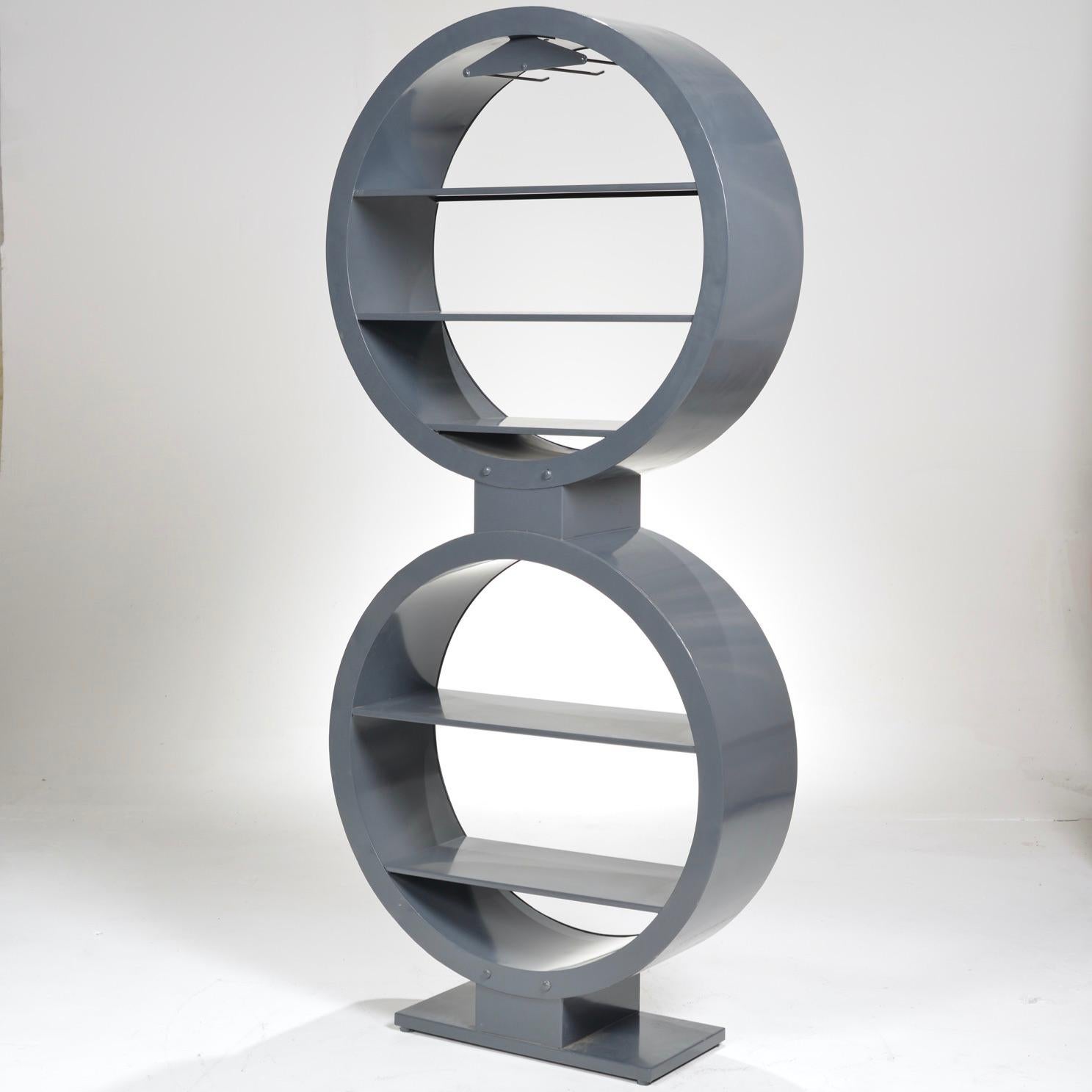 Modern, sculptural circular étagère, shelf unit, bar, or bookshelf constructed of steel.

All items are available to view at our DTLA Arts District Warehouse
Motley LA
1909 E 7th St.
Los Angeles, CA 90021.