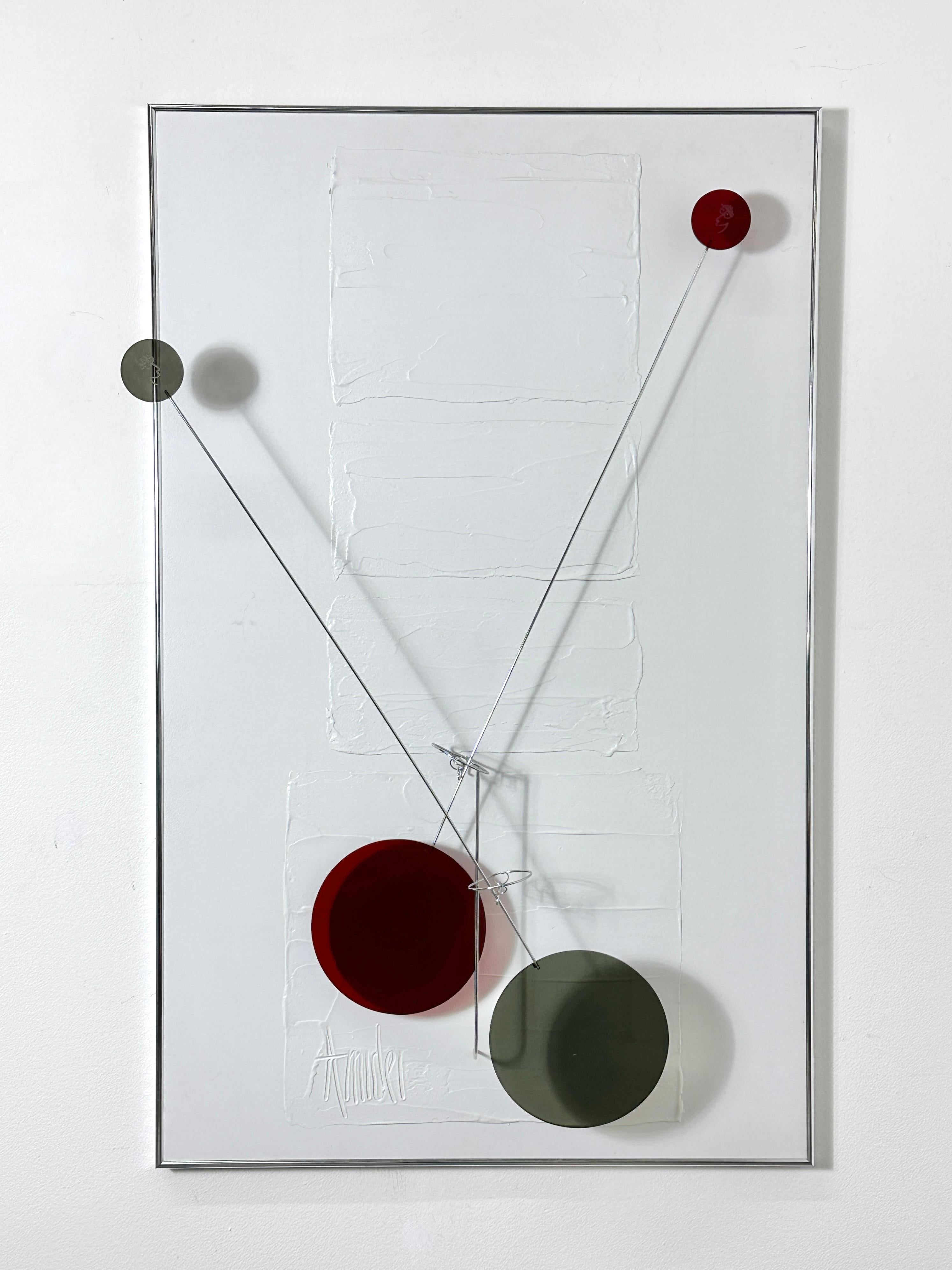 Unique wall sculpture by Chicago artist Amidei 1987

Kinetic pendulums with alternating deep red and smoked Lucite discs that oscillate against a white abstract textured canvas
Framed in chrome and signed both front and back

30 inches wide
48