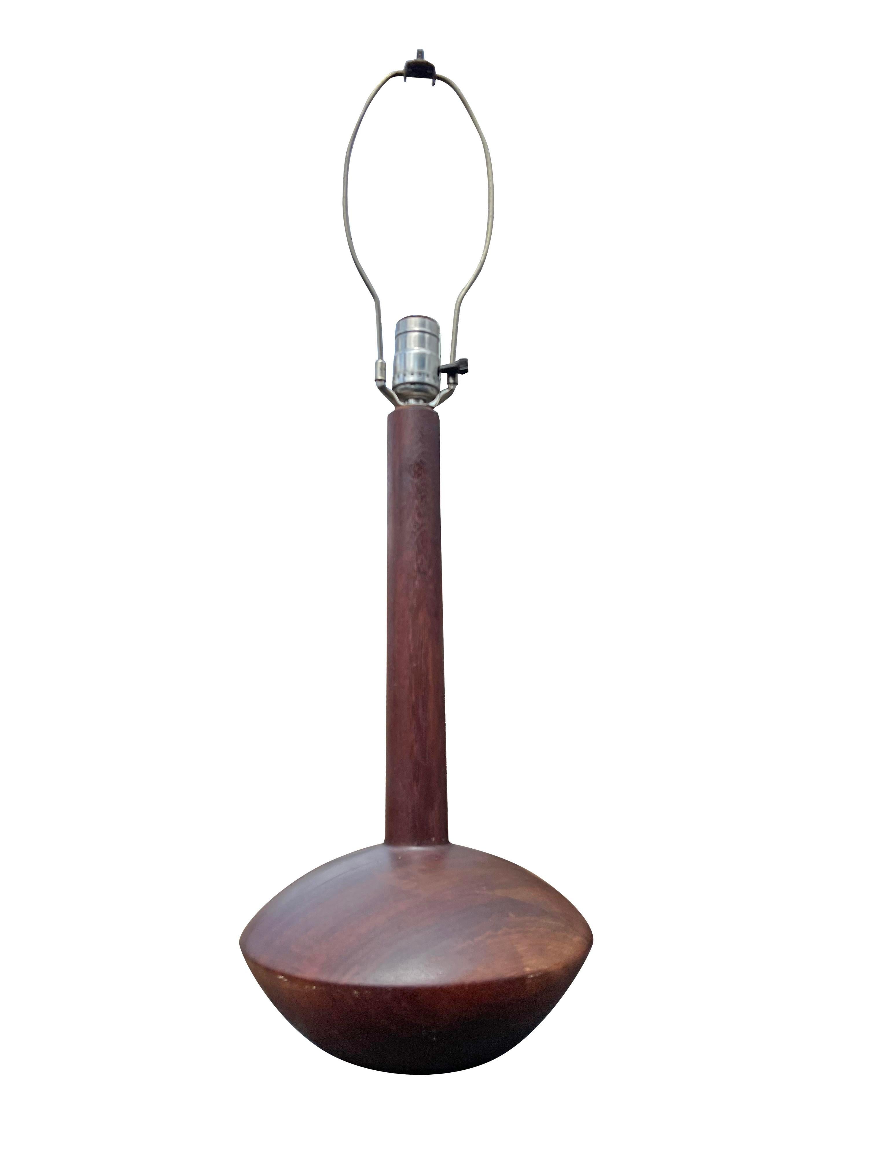 Vintage Danish Modern Teak Floor Lamp.

Elevate your living space with this stunning Vintage Danish Modern Teak Floor Lamp. This iconic piece combines sleek design with exceptional functionality.

Key Features:
Danish Modern Design: The minimalist