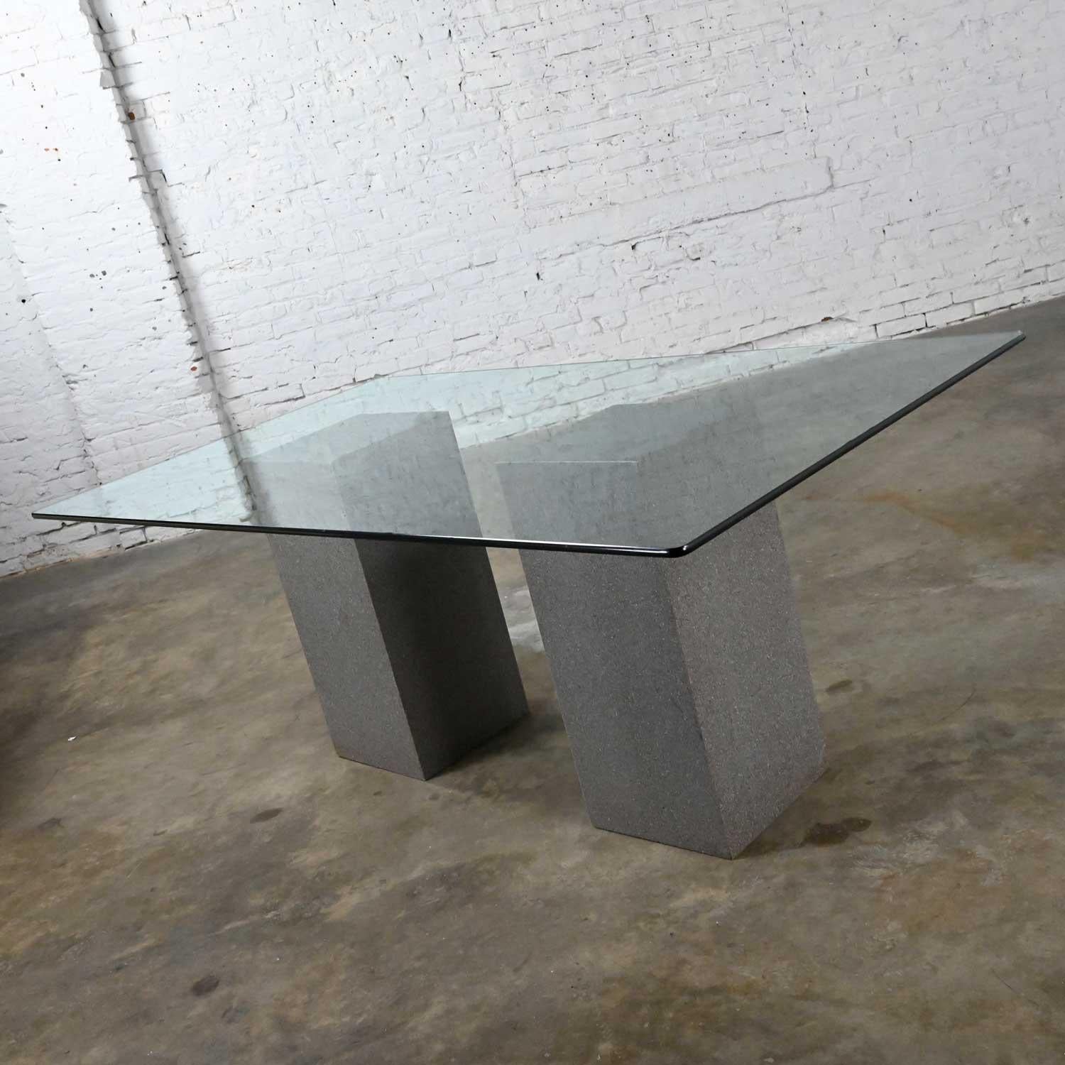 white rectangular pedestal dining table