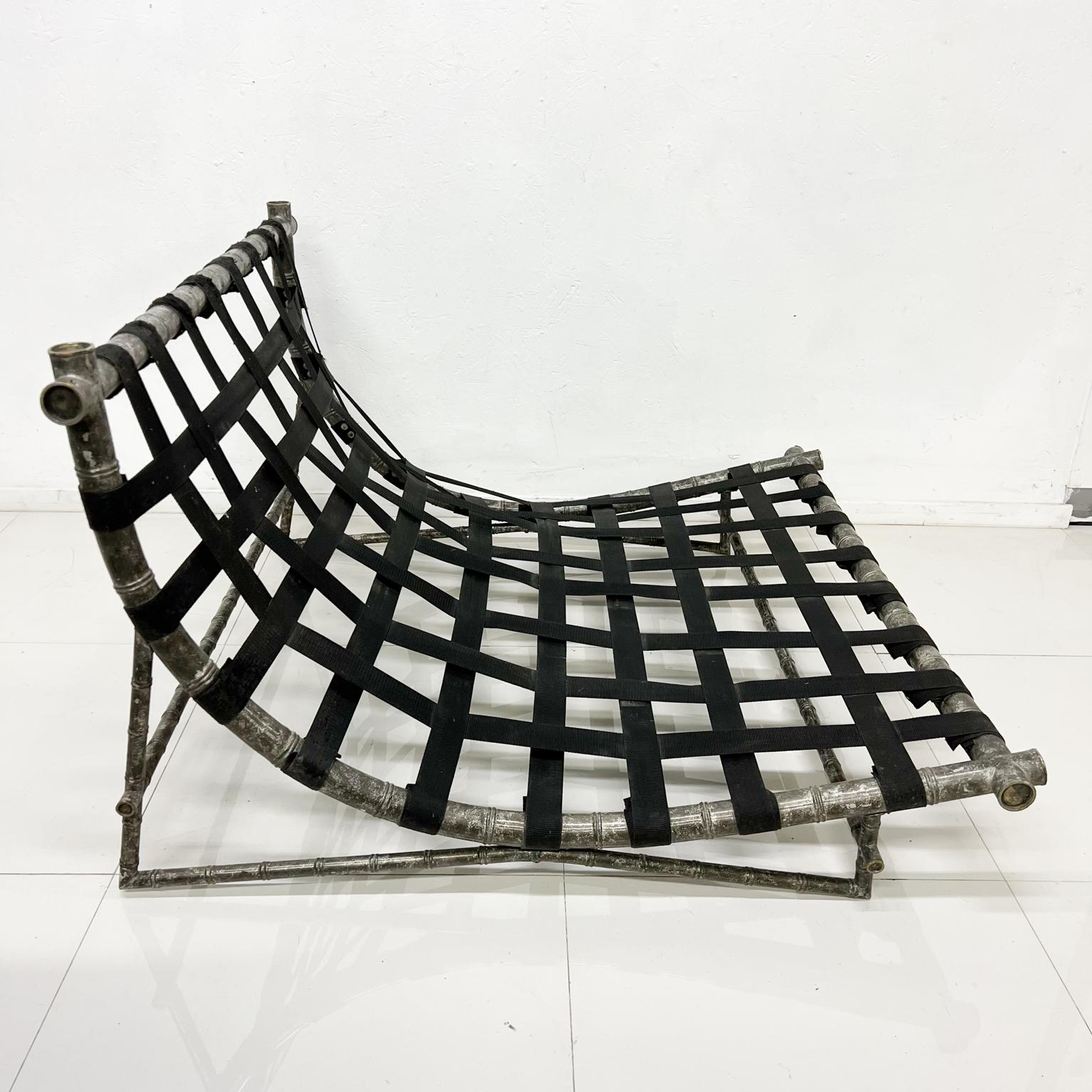 1960s Modern Contoured Low Chaise Lounge chair from Mexico City
Faux Bamboo and Aluminum
Era of Arturo Pani. 
No label.
28.5 h x 45.25 w x 45.5 d
Unrestored preowned original vintage condition
See all images shown.
Delivery to LA and OC
