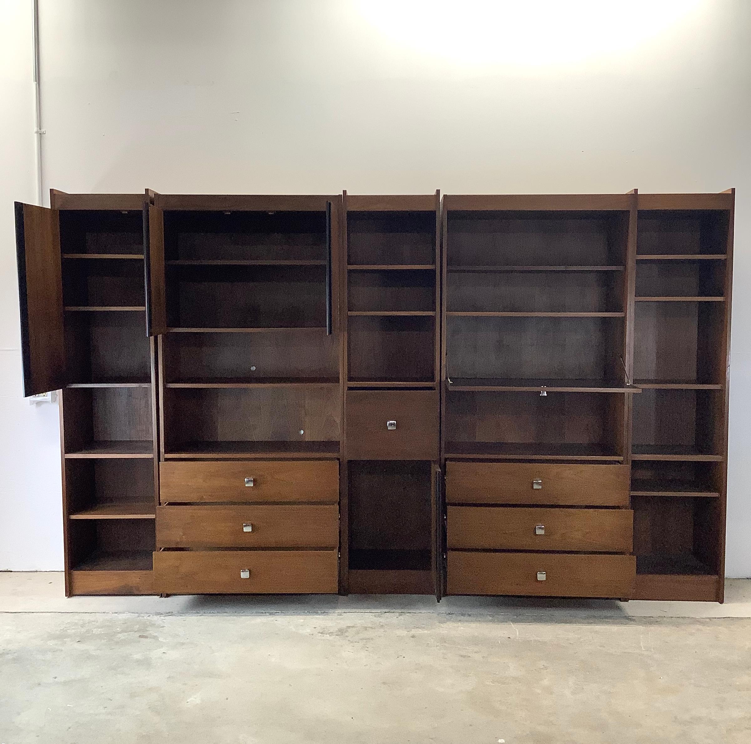 Imagine the storage possibilities of this Vintage Modern Five Piece Wood Bookcase – a versatile and stylish storage solution that adds both functionality and flair to any home or office space. Crafted with quality wood in a timeless mid-century