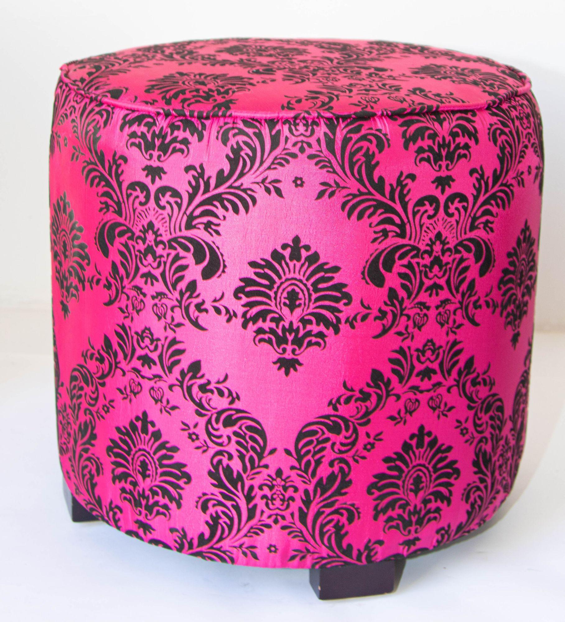 Pair of modern fuchsia and black Moroccan Art Deco Style stools.
 The upholstery is a damask fabric in floral taffeta with a raised velvet printed texture.
Pair of modern Contemporary round Moroccan style stool in pink fabric upholstery in 1970s