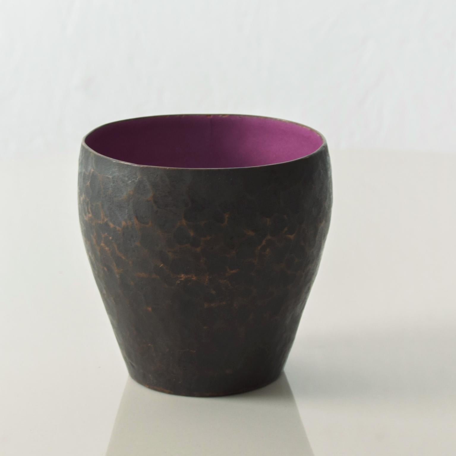 AMBIANIC presents
Petite Hammered Copper Enamel Vase with Purple Interior
Signed Raul Bellery
Dimensions: 2.75 H x 3 in diameter
Original Vintage unrestored preowned Condition.
Please see the images.