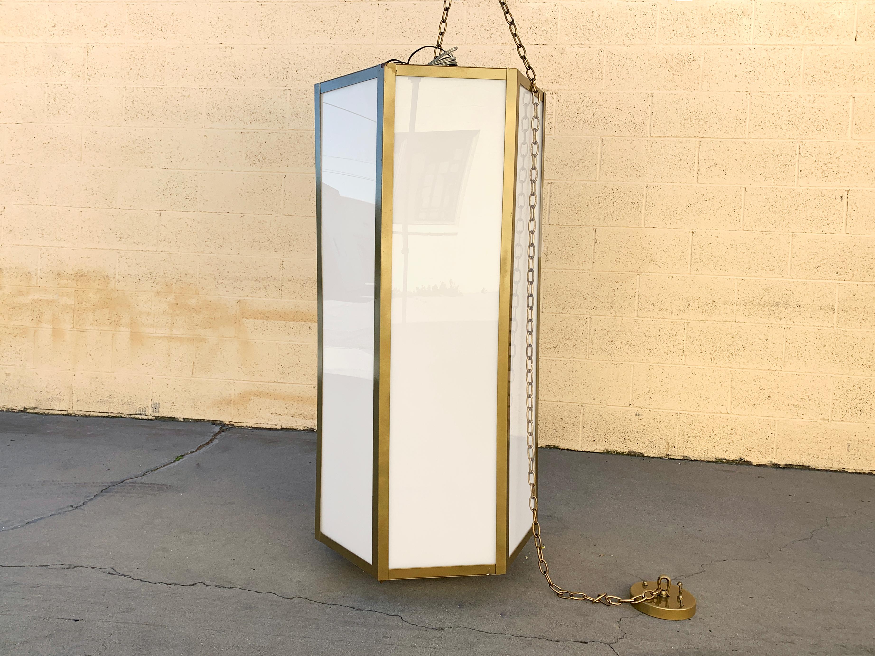 Large six-sided pendant light fixture made of a powder-coated gold steel frame with white plexi faces. Holds 12-lights. Fab modern geometric styling; probably newer made circa 2000. Vintage paint shows a little wear as pictured. Fully functional