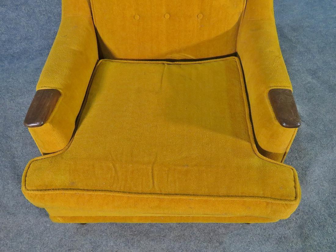 Mid-Century Modern lounge chair featuring yellow upholstered fabric, and walnut accents.

Please confirm item location NY or NJ with dealer.

 