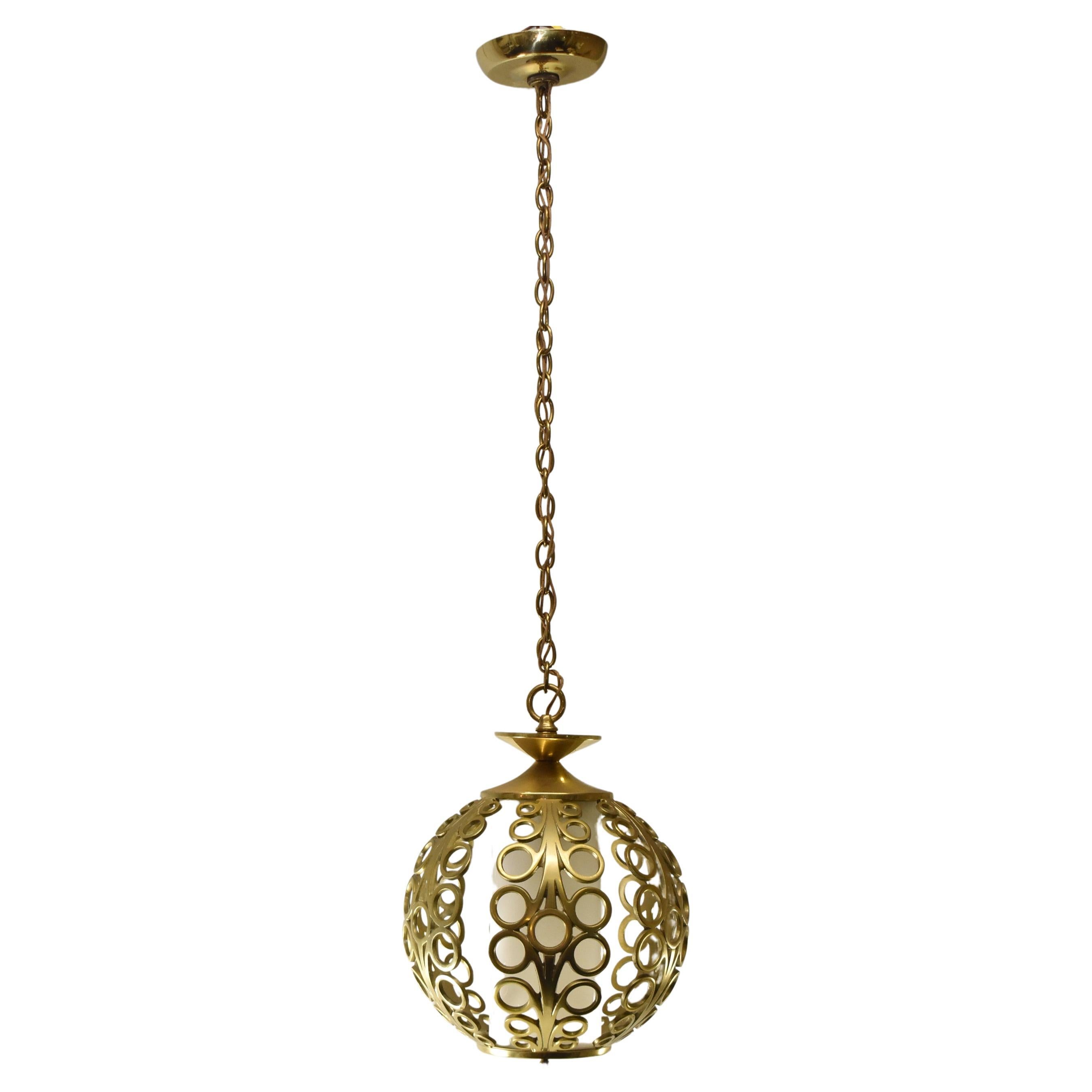 Vintage Modern Hollywood Regency Brass Round Chandelier Pendant with open work design, single socket with opaque white diffuser shade. Pendant is 11 1/2
