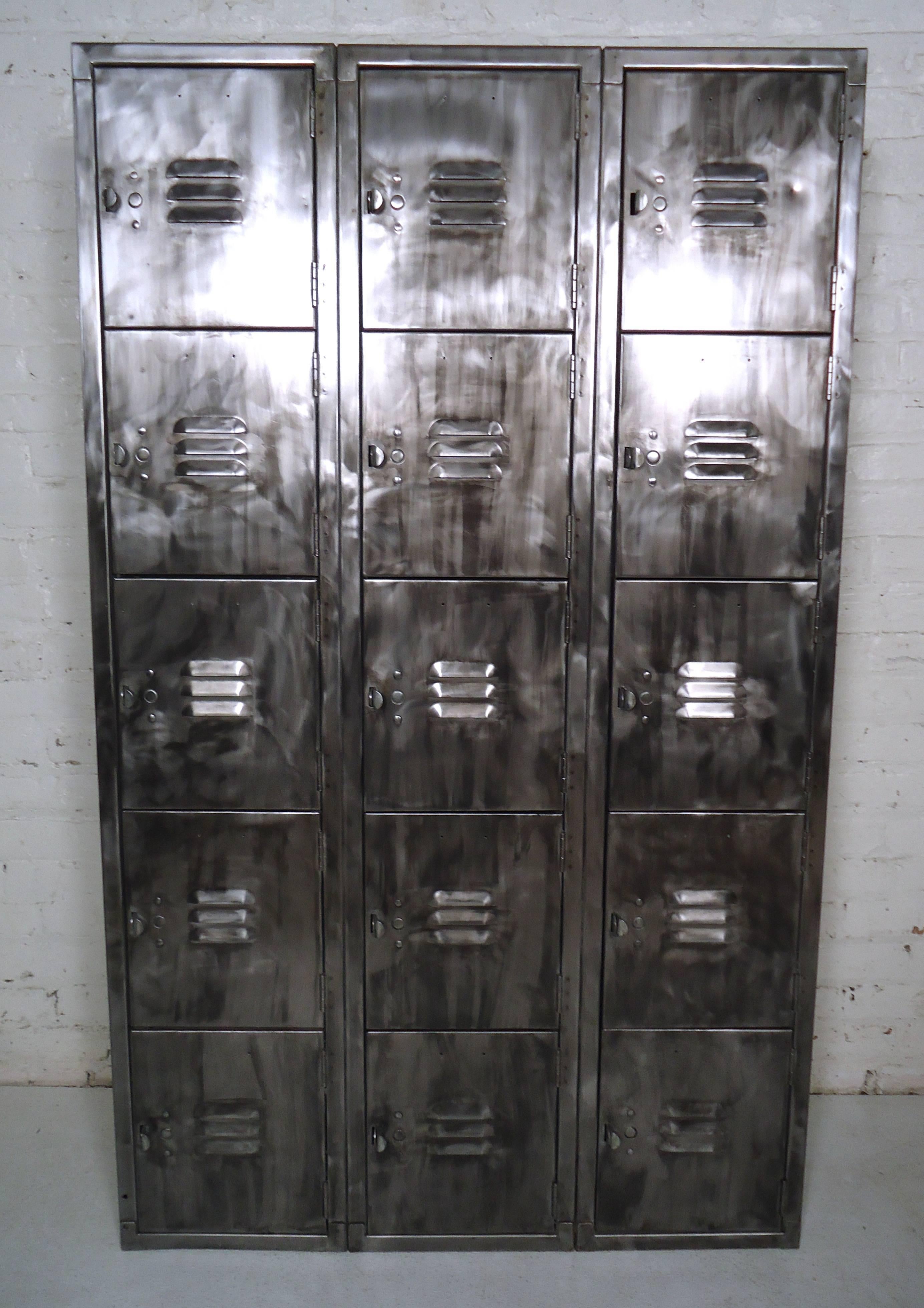 Industrial style metal locker unit with fifteen compartments. Each locker has spacious room and vents. Great storage for kitchen or entry way in your modern home.

(Please confirm item location - NY or NJ - with dealer).