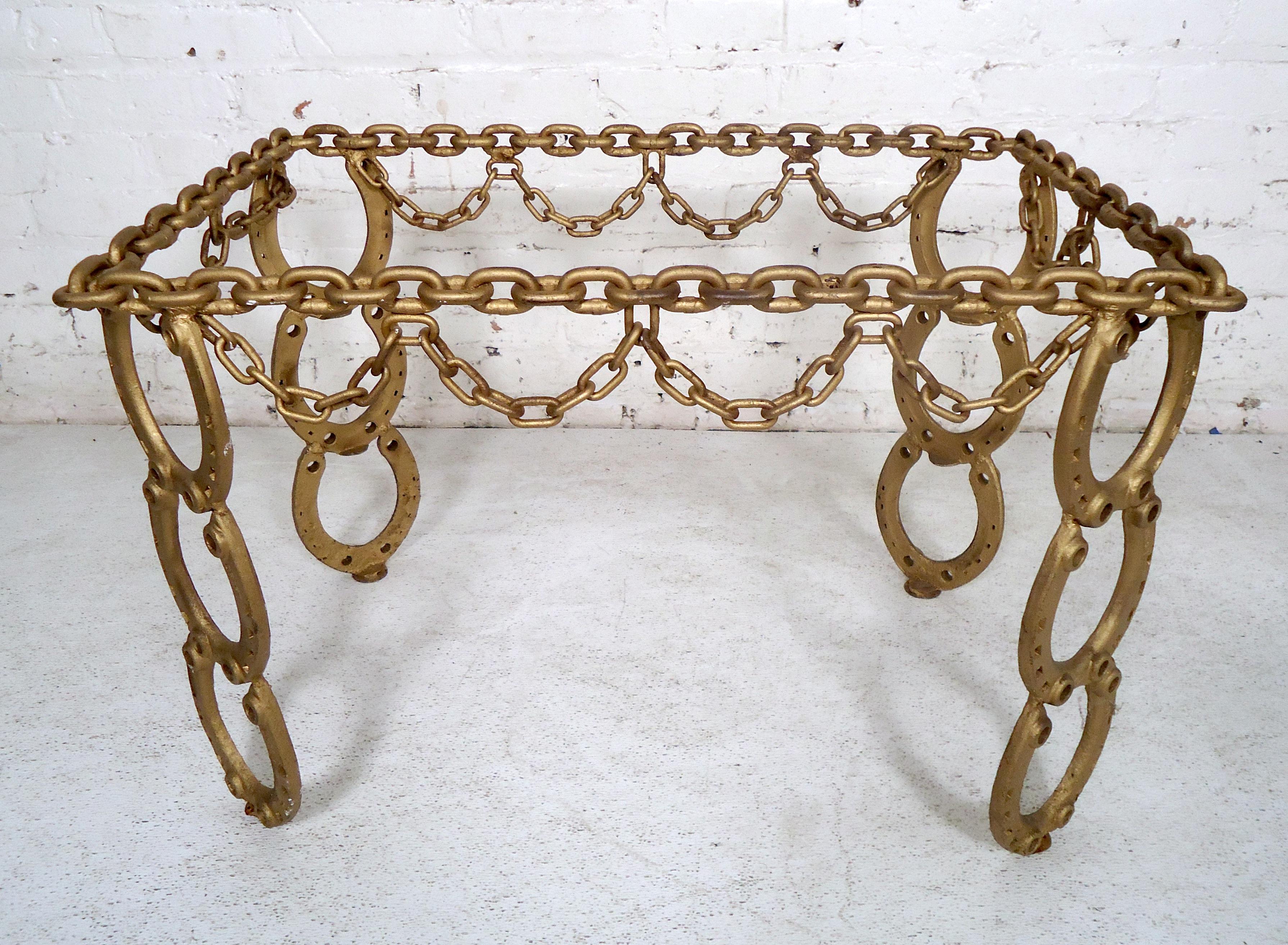 Uniquely designed vintage iron side table featuring a chain top and horseshoe legs.

(Please confirm item location - NY or NJ - with dealer).