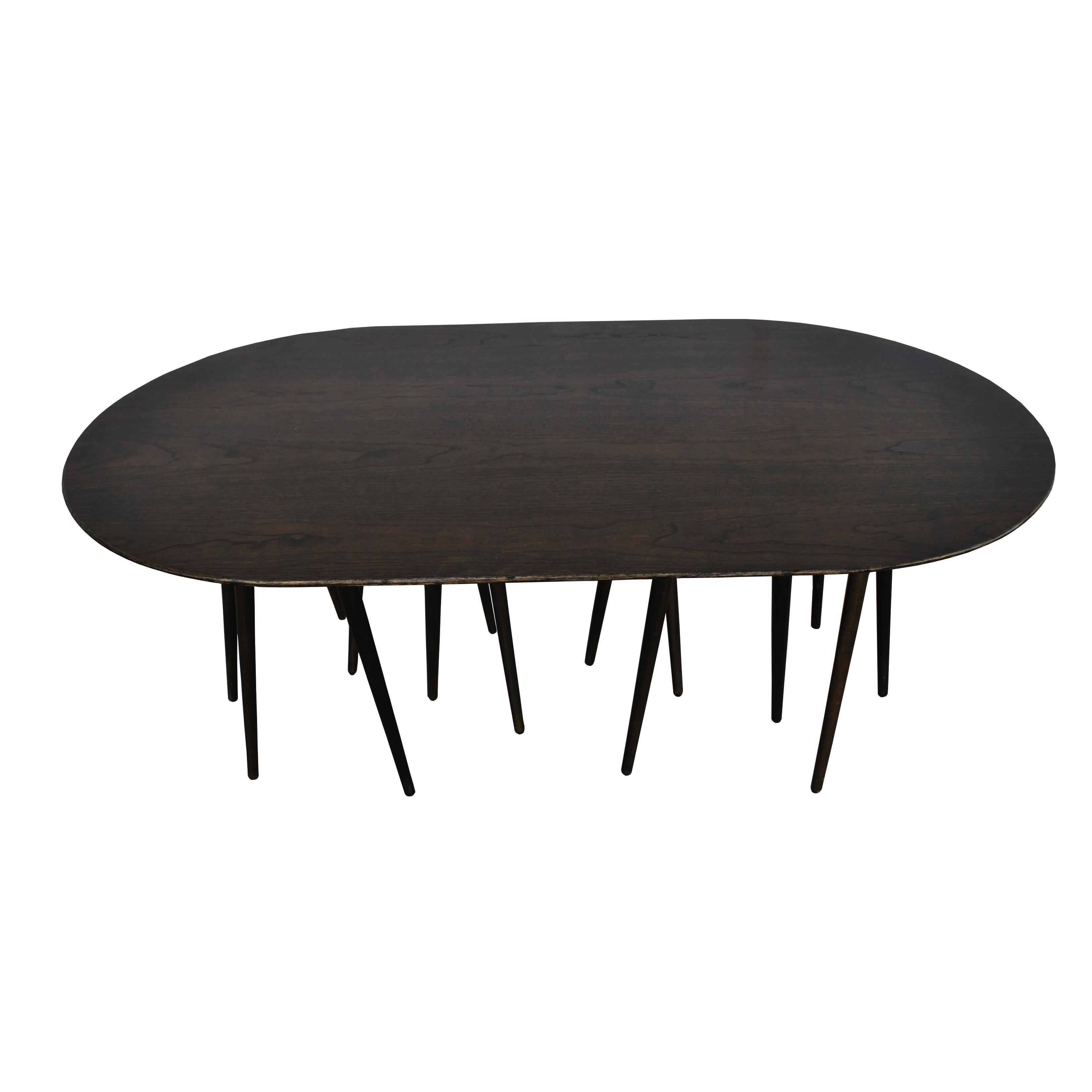 Toothpick table by Lawrence Laske for Knoll
1993 

Lawrence Laske designed the toothpick cactus table for Knoll in 1993. His inspiration was nature and based on simple, organic forms rendered from natural materials. 

The oval birch top and