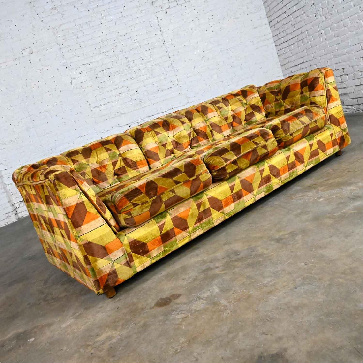 Awesome vintage Modern Kroehler multi color geometric pattern button tufted tuxedo style sofa. Beautiful condition, keeping in mind that this is vintage and not new so will have signs of use and wear. We did find a couple of wear spots on the fabric