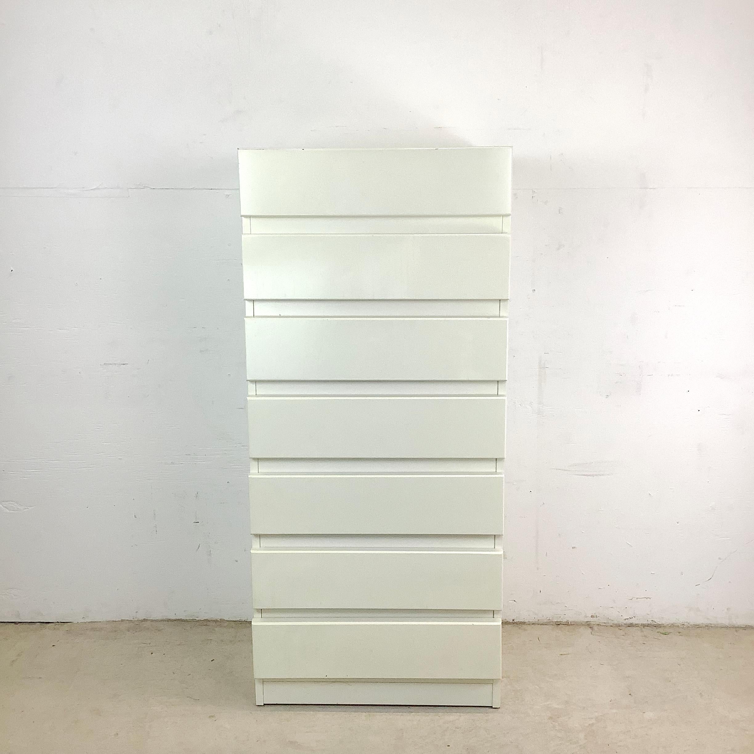 Elevate your personal space with this refined vintage modern lingerie chest, designed to offer both exceptional style and everyday functionality. Its sleek white lacquer finish and integrated vanity mirror come together to form a piece that is as