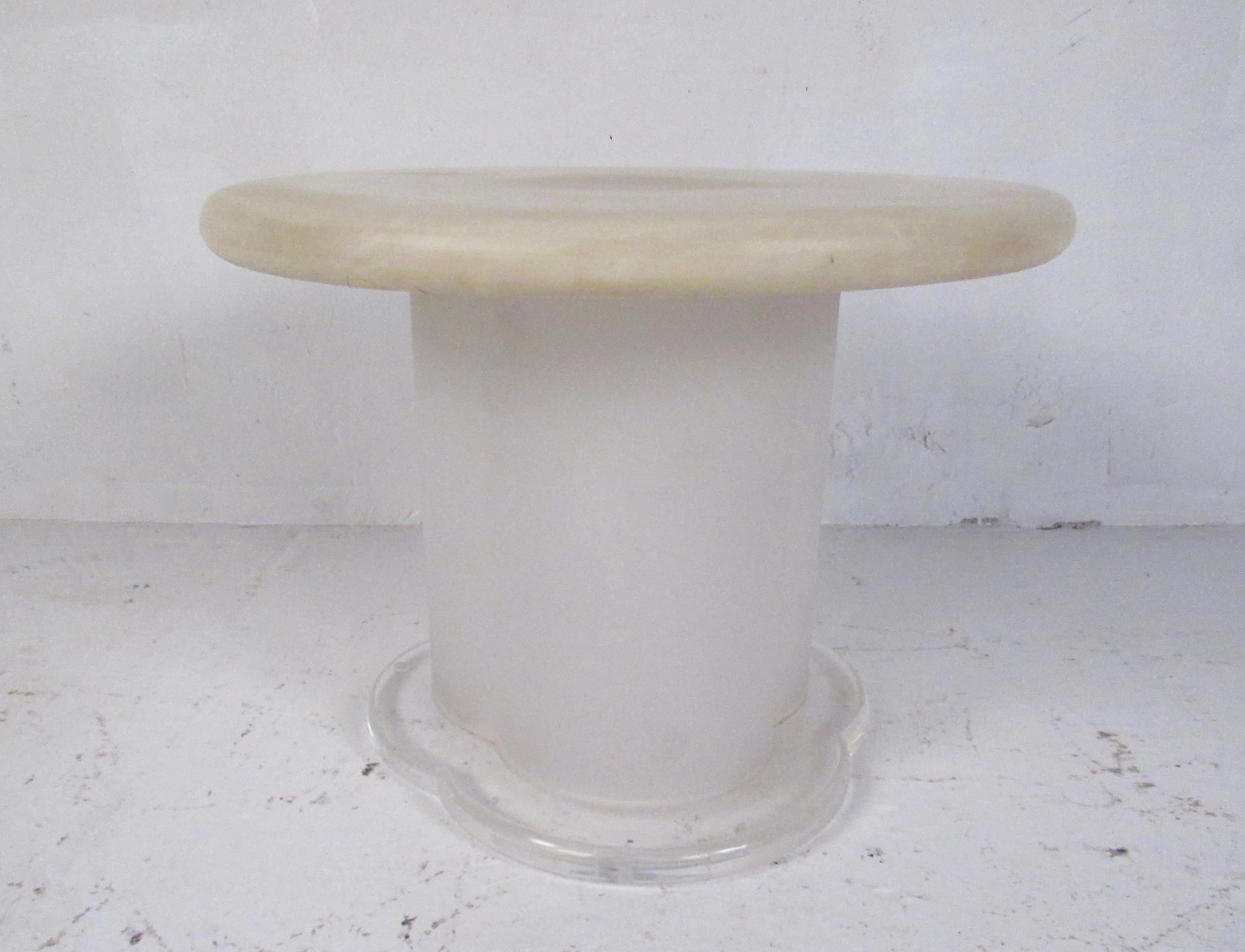 This unique low end table features unique two-tone Lucite/acrylic construction and makes a stylish Mid-Century Modern addition to home or business seating arrangement. Karl Springer style adds contemporary modern flare to any interior. Please