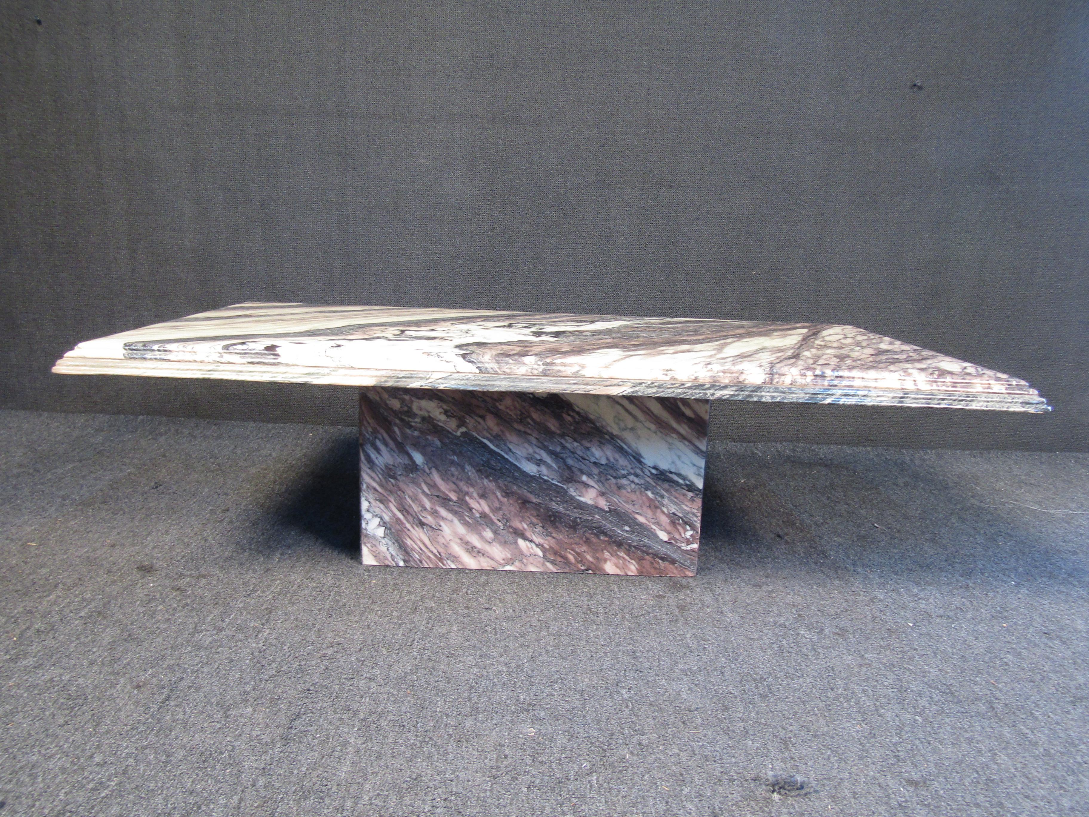 Interesting marble coffee table featuring a full marble construction including the base. The top sits on without latches or fasteners.
Please confirm item location (NY or NJ).