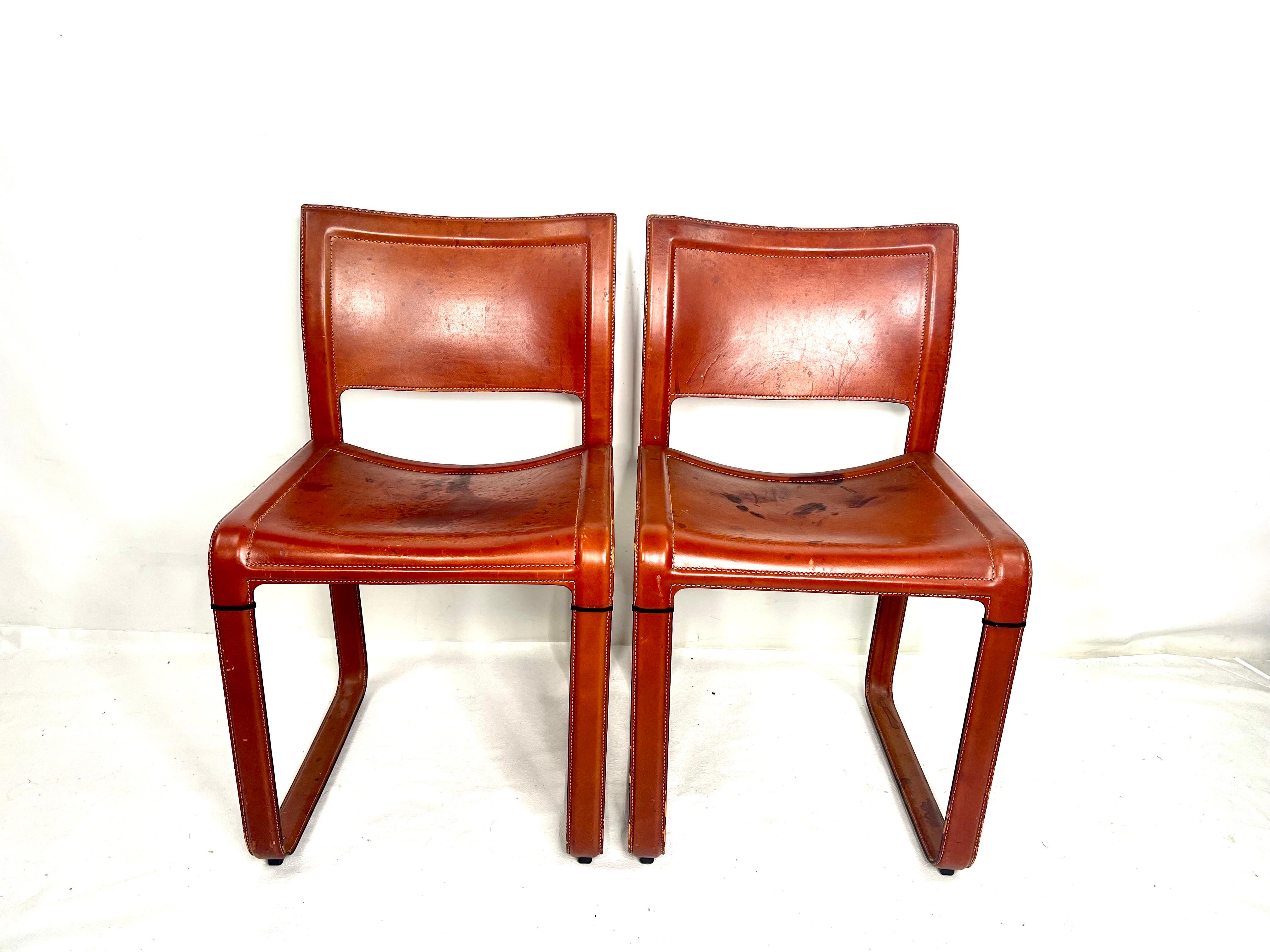 This is a very nice all original pair of chairs made by Matteo Grassi. The chairs have a great patina from age.