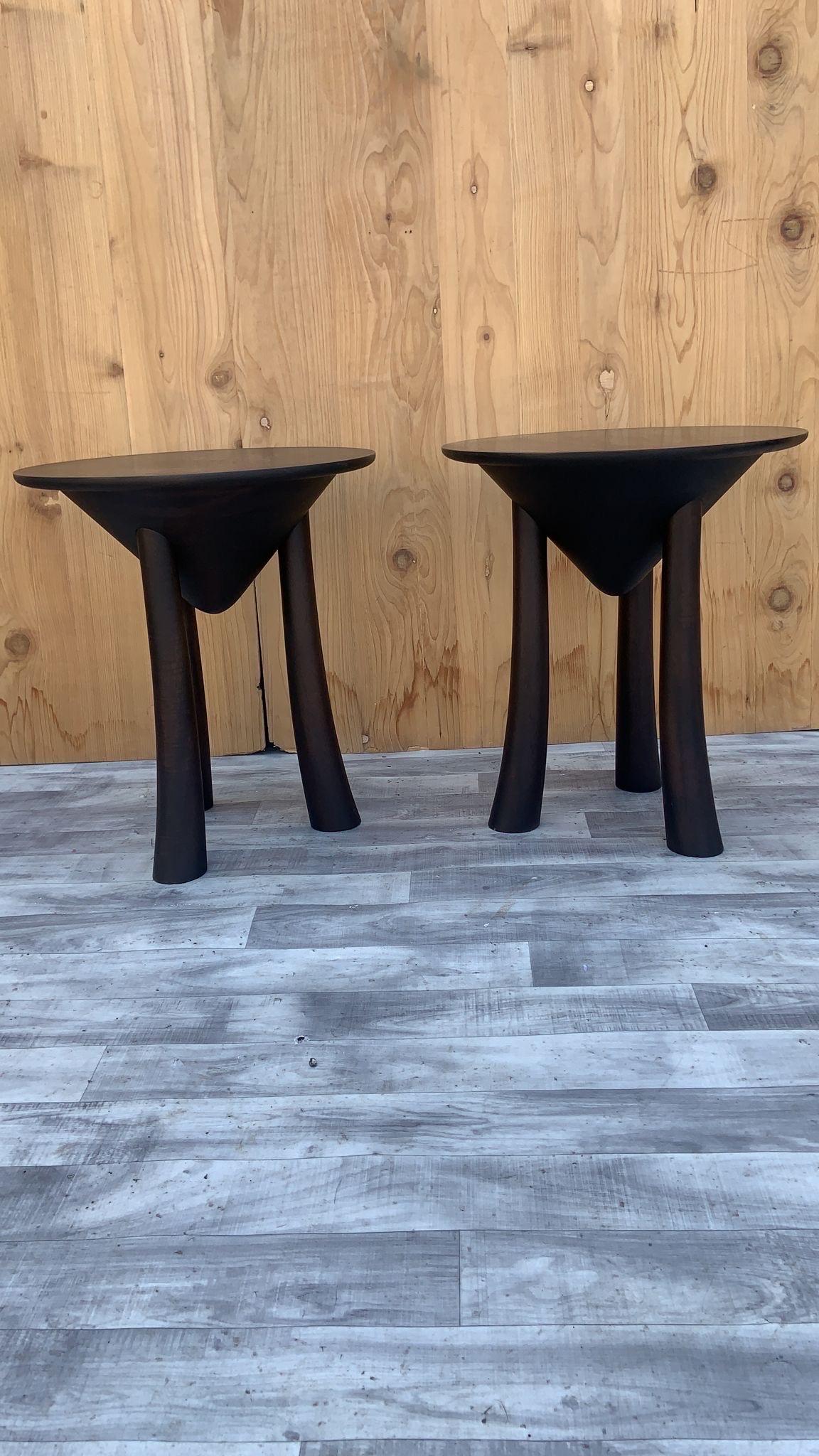 Vintage Modern Minimalist Sculpted 3 Arched Leg Side Table - Pair 

Made in the style of ethnic minimalism, the collection items introduce “Senufo design.
