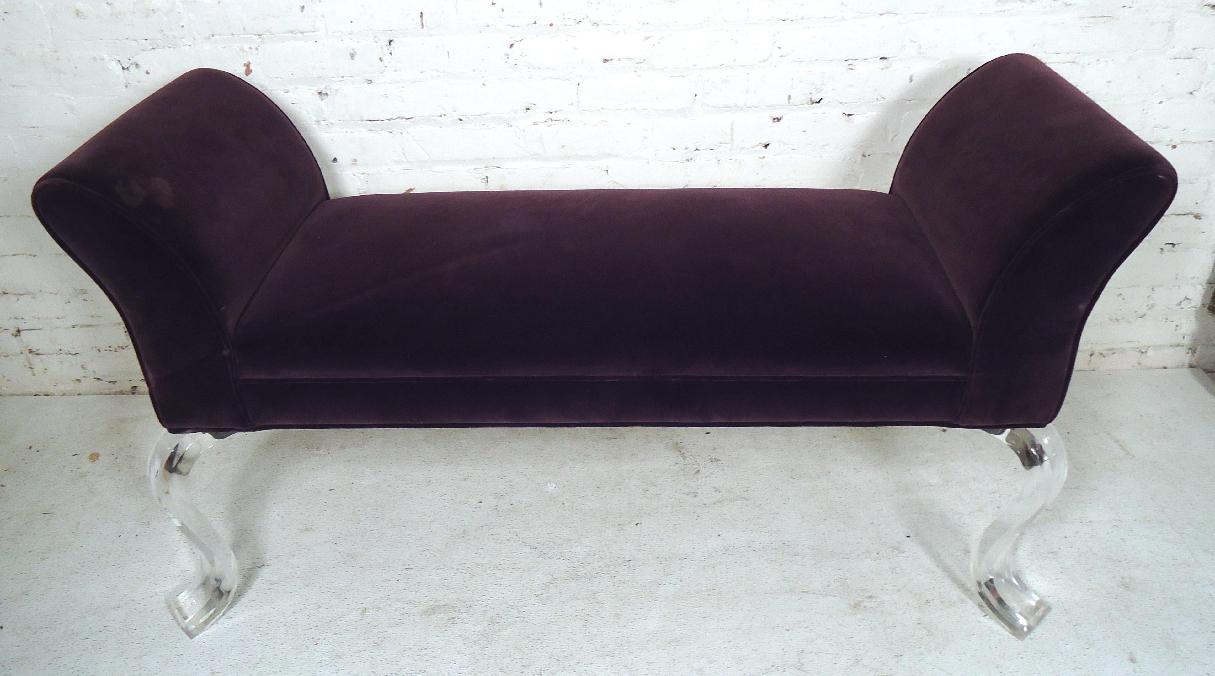 This Mid-Century Modern style bench is featured in purple upholstery on a set of curved Lucite legs, can be used as an entry way or bedroom bench.

(Please confirm item location - NY or NJ - with dealer).