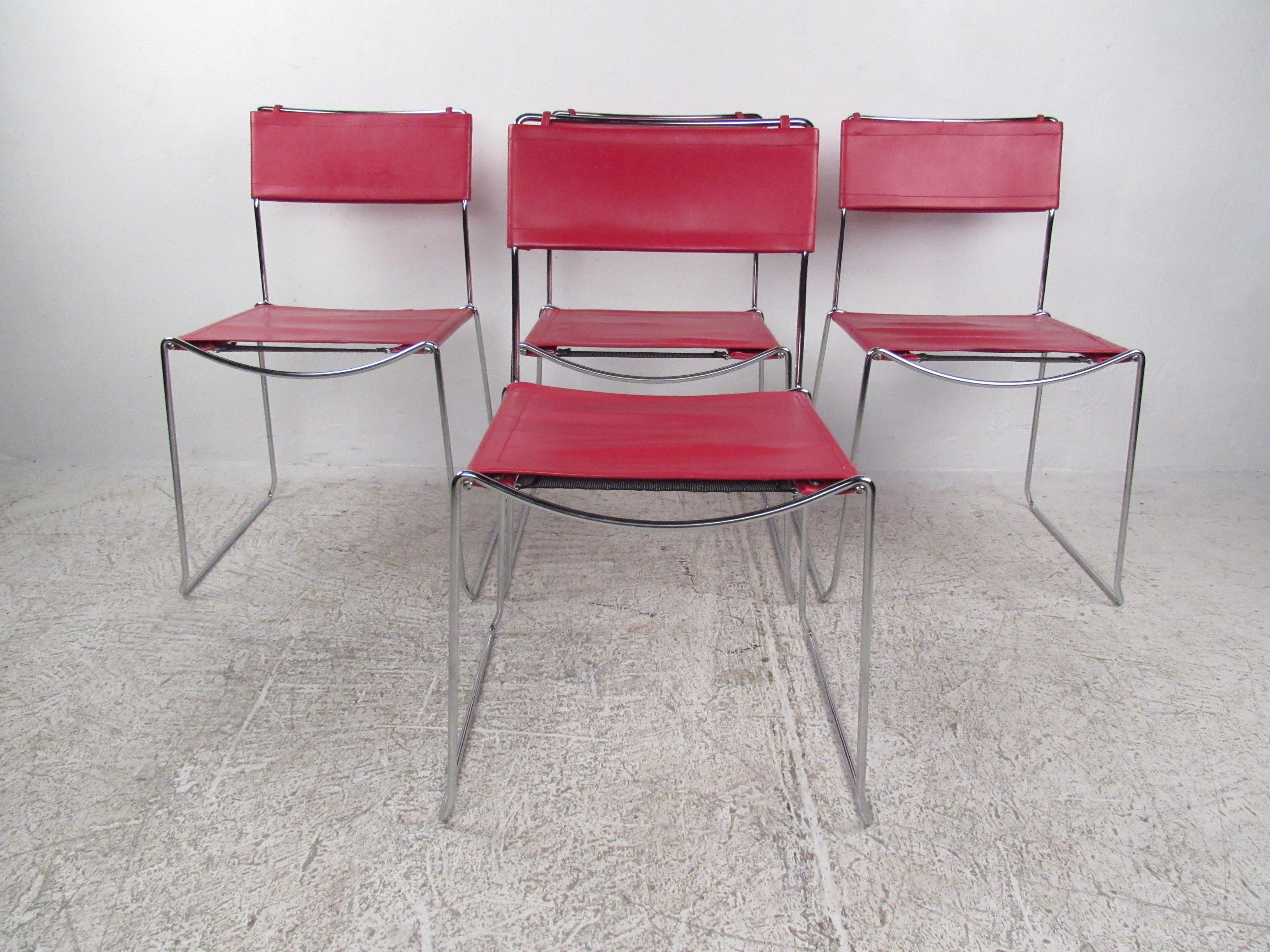 A set of Mid-Century Modern red leather and chrome chairs. Vibrant design with a stunning chrome accent. Perfect for any bar/office/home setting. Please confirm pickup with seller (NY/NJ).