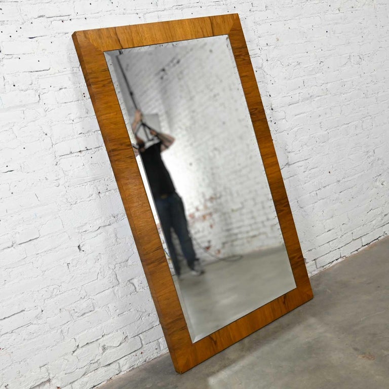 Fabulous vintage modern large mirror by Milo Baughman for Thayer Coggin. Comprised of gorgeous rosewood veneer and mirror glass with beveled edges. Beautiful condition, keeping in mind that this is vintage and not new so will have signs of use and