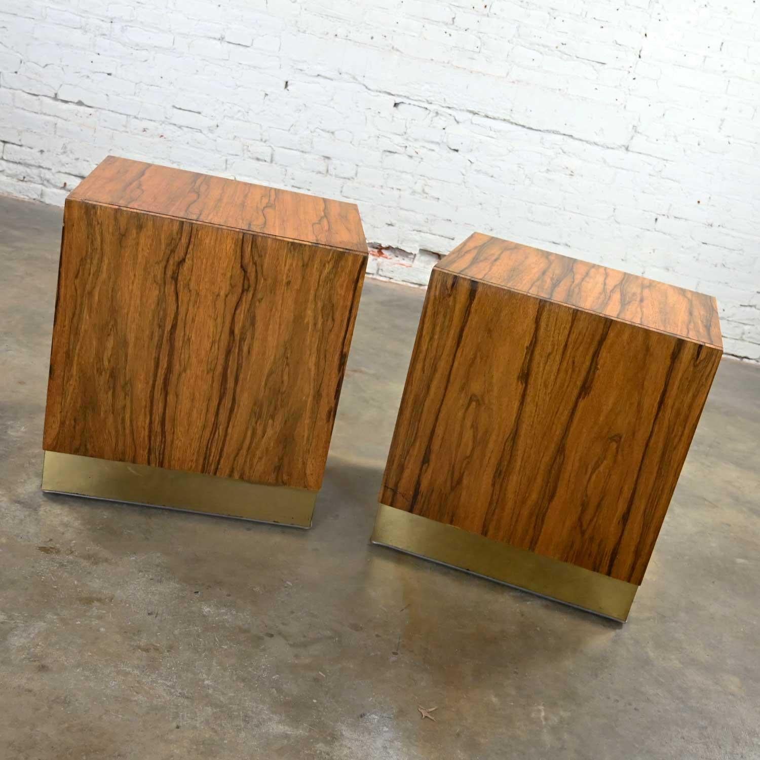 Gorgeous vintage modern rosewood pair of cube shaped nightstands by Milo Baughman for Thayer Coggin. Comprised of gorgeous rosewood veneer, brass plated steel bands, and a single ebonized drawer in each nightstand. Beautiful condition, keeping in