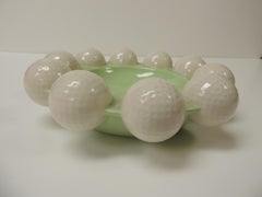 Vieux cendrier moderne rond vert et blanc pour balles de golf