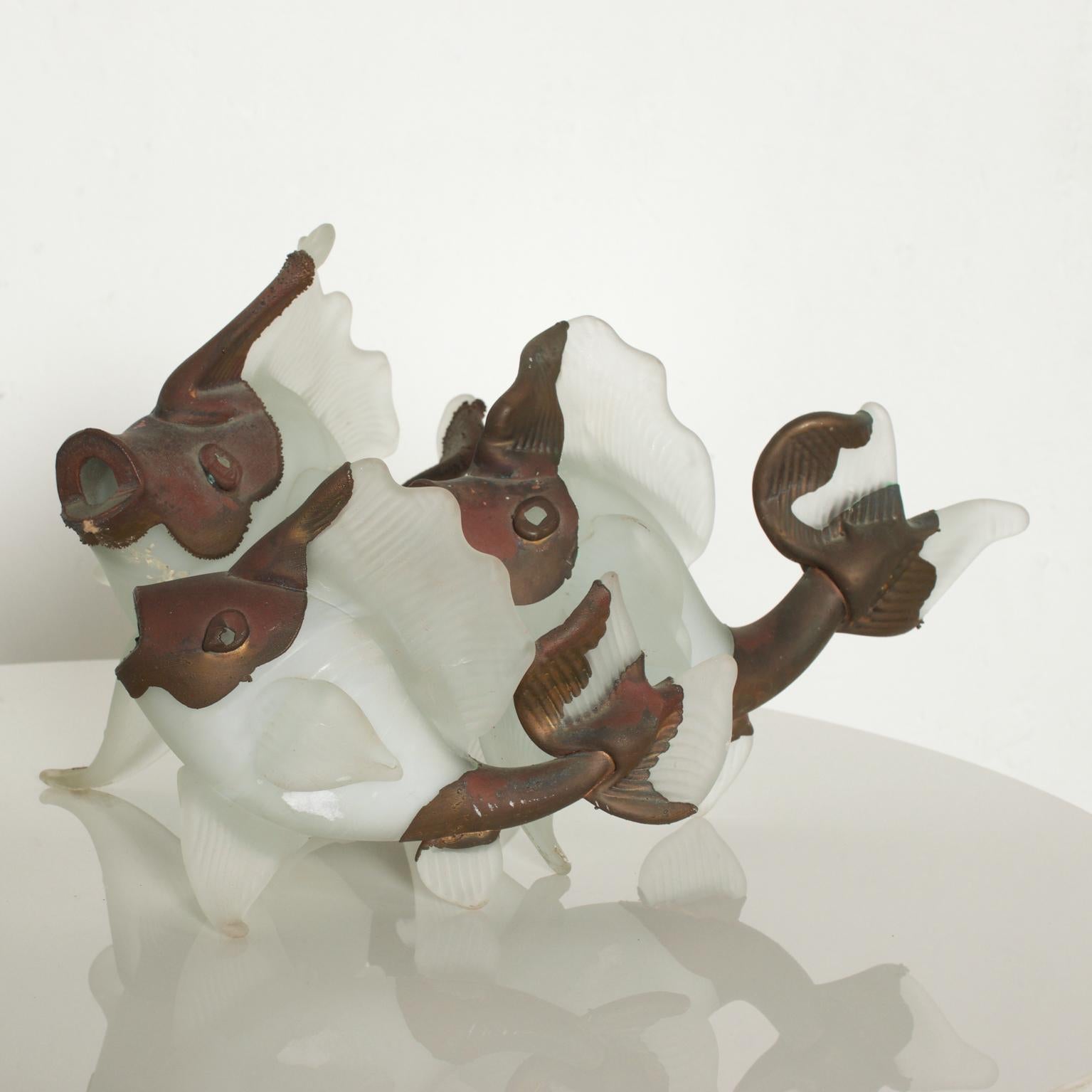 For your pleasure: Elegant Vintage Modern Set of 3 fish designed with hand blown glass and trimmed in copper. By Romanian Artist, Filip Ravert dimensions: #1-11 /2