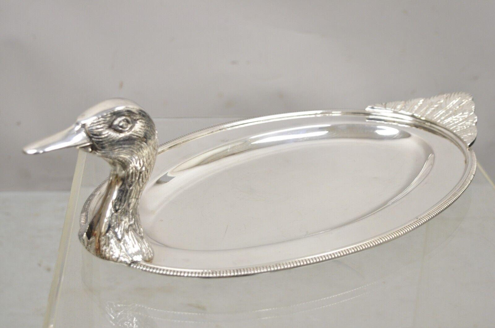 Vintage Modern silver plated duck mallard serving platter attr. Teghini Firenze. Item features a unique figural form, wonderful detail, maker unconfirmed as stamp is worn but attributed to Teghini Firenze. Circa mid 20th century. Measurements: 5