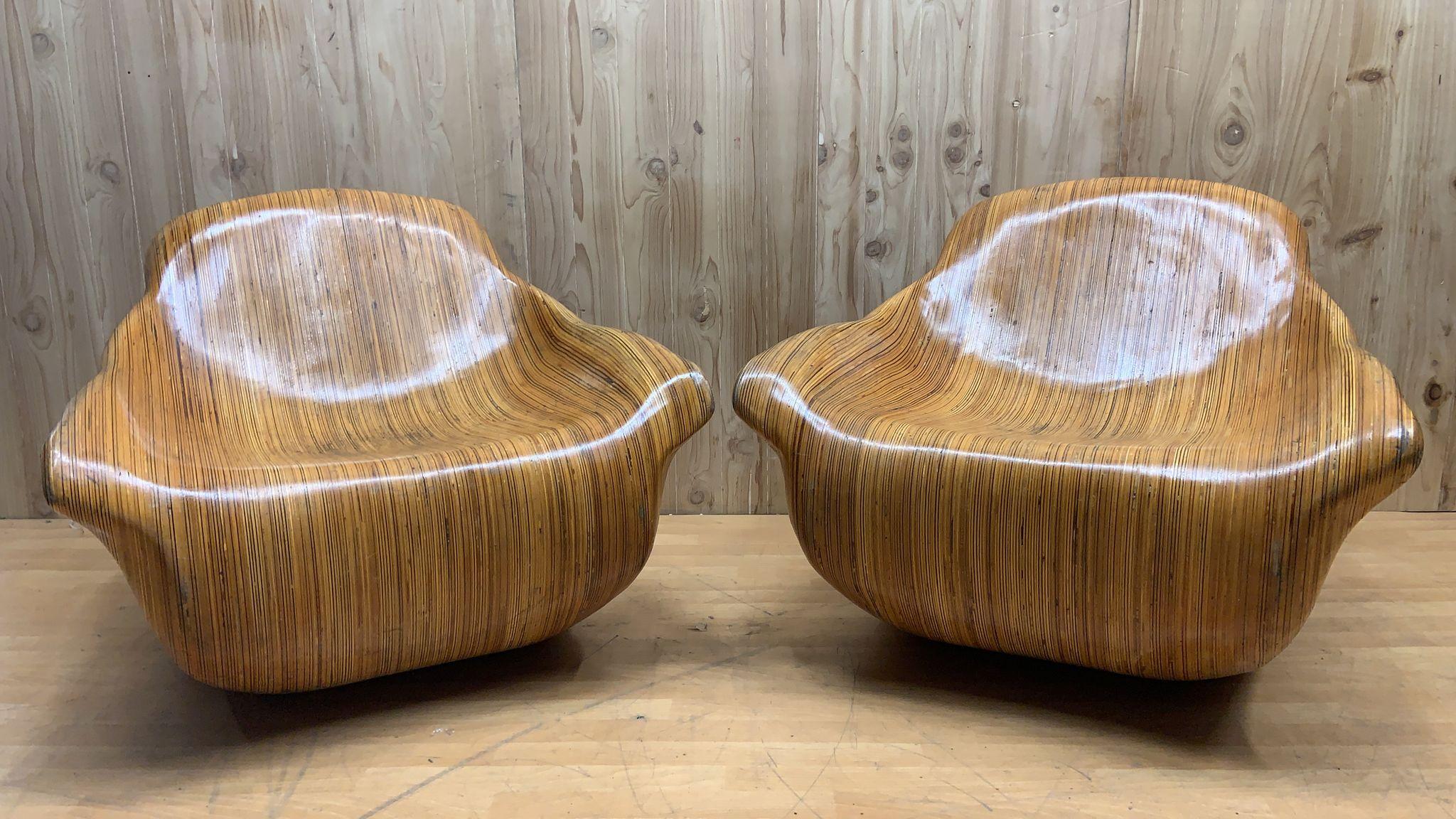 Vintage Modern Strata Chair by Stew Design - Pair 

The Strata Chair was inspired by geologic formations of the American Southwest. Its smooth exterior juxtaposes the rough raw interior, echoing the erosion process.

The Strata Chairs are from