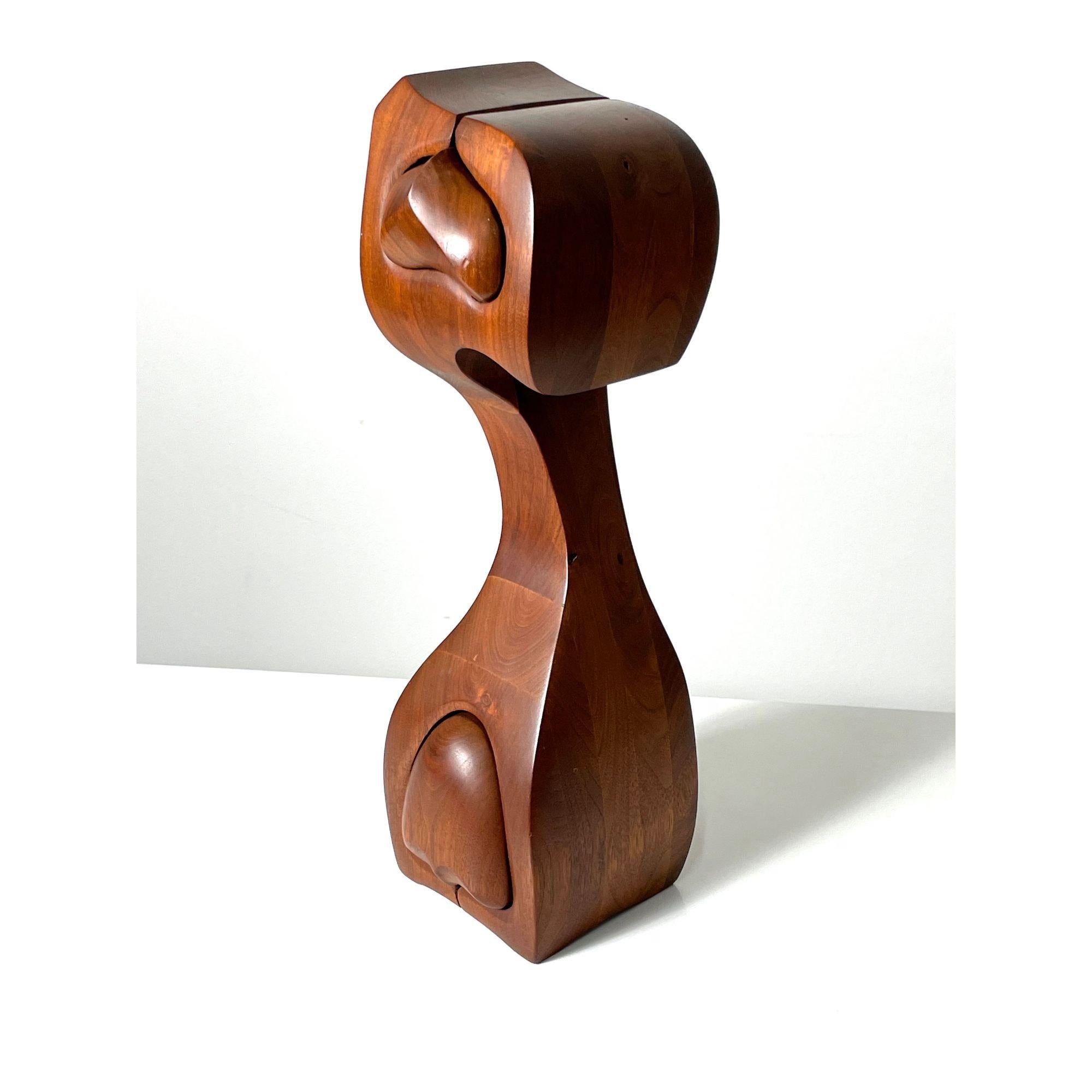 Signed vintage Studio Craft Walnut Puzzle Box 

Signed Bob Goldsmith puzzle box titled Rosie's Desire 1982
Carved walnut abstract form with two slide through drawers
Signed to underside

Additional Information:
Materials: Walnut
Dimensions: 7