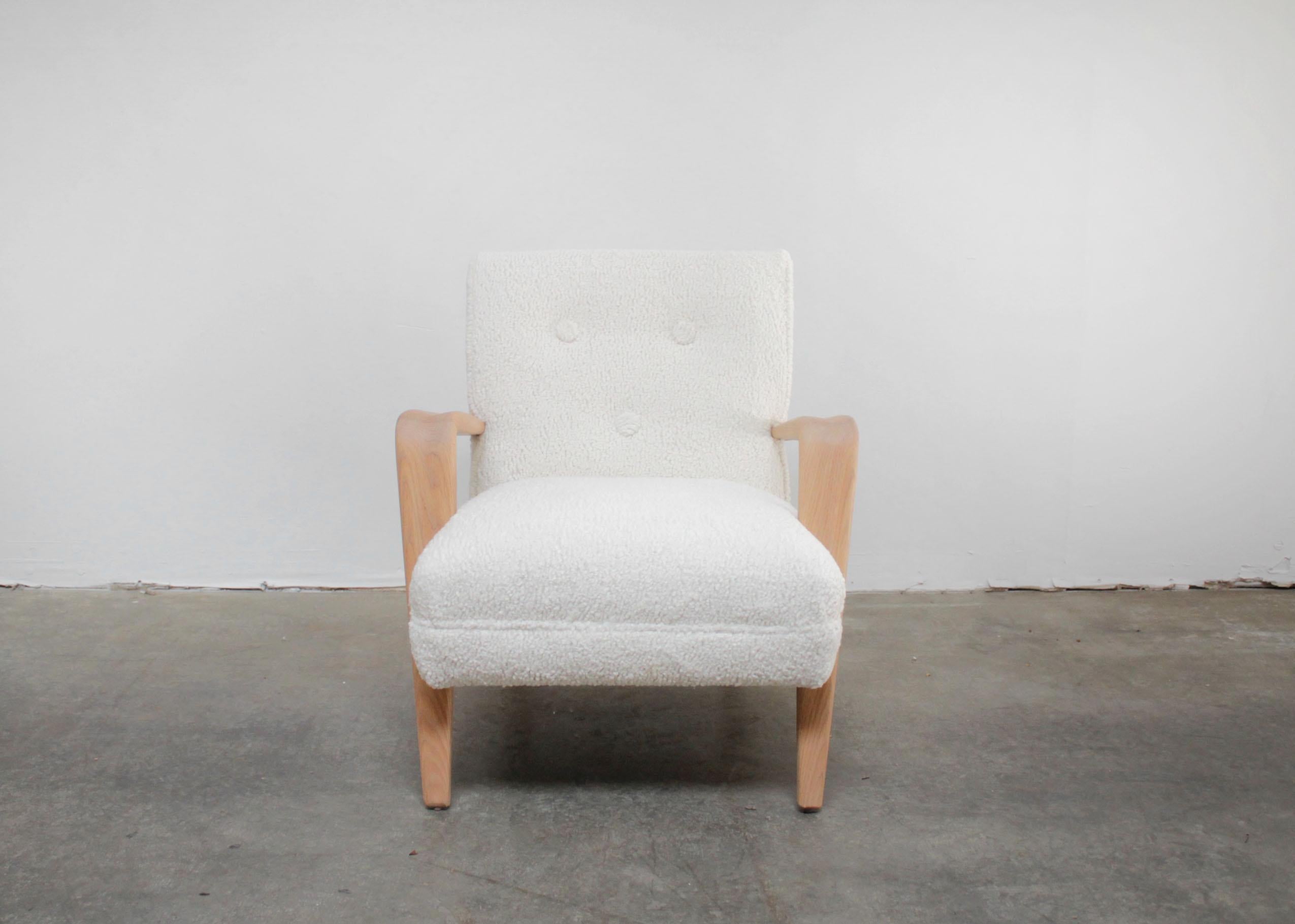 Vintage modern style chair with white oak arms and faux sheep upholstery
This chair is available, with a 6- 8 week lead time.
Upholstered in a faux sheep material, can be upholstered in any of our linens, leathers, mohairs, or COM
Size:
27.5