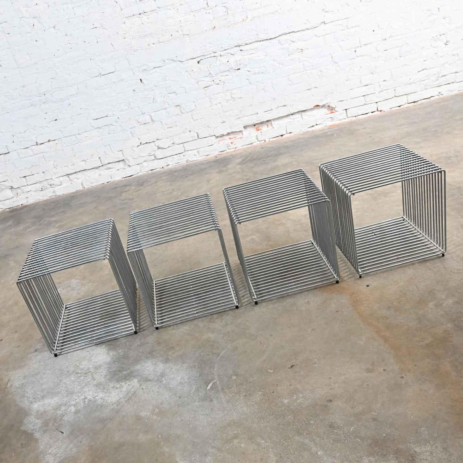 Iconic vintage modern set of four chrome wire Pantonova cubes by Verner Panton. These have been attributed based upon archived research including online sources, vintage documentation and catalogs, designer literature, and other materials. Beautiful