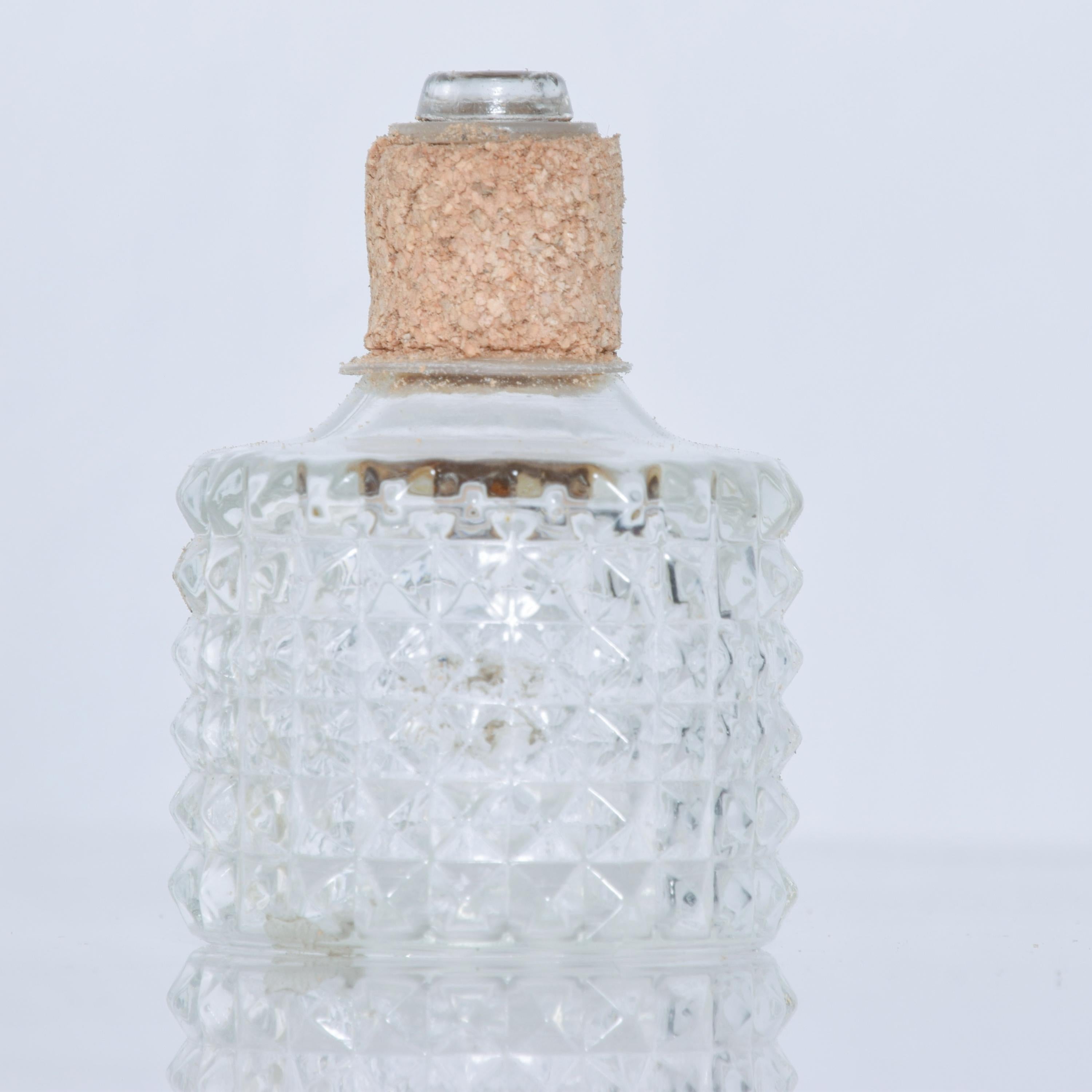 glass whisky bottle with cork
