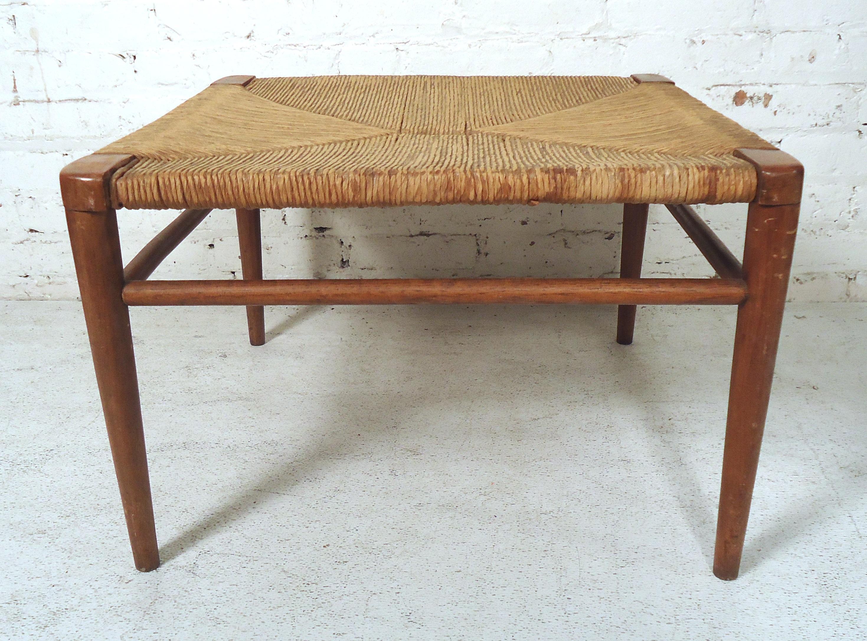 Beautiful Mid-Century Modern woven rope bench featured on rich teak grain tapered legs.

(Please confirm item location-NY or NJ-with dealer).