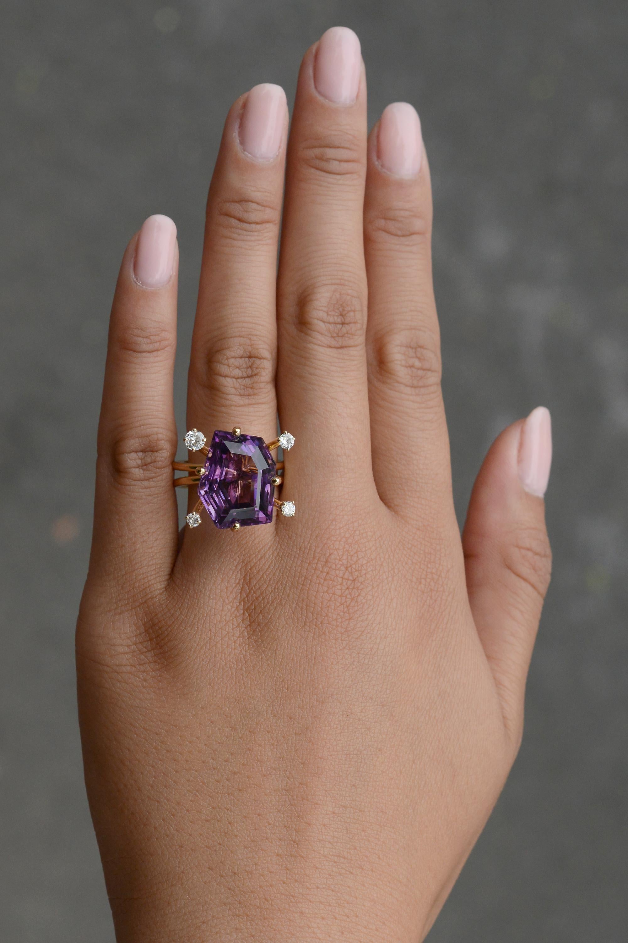 This exquisite amethyst and cocktail ring is truly a one of a kind estate jewel hailing from the Sputnik-era, circa late 1950s - early 1960s. An affordable luxury, this wildly geometric Modernist heirloom will surely become a treasured part of your