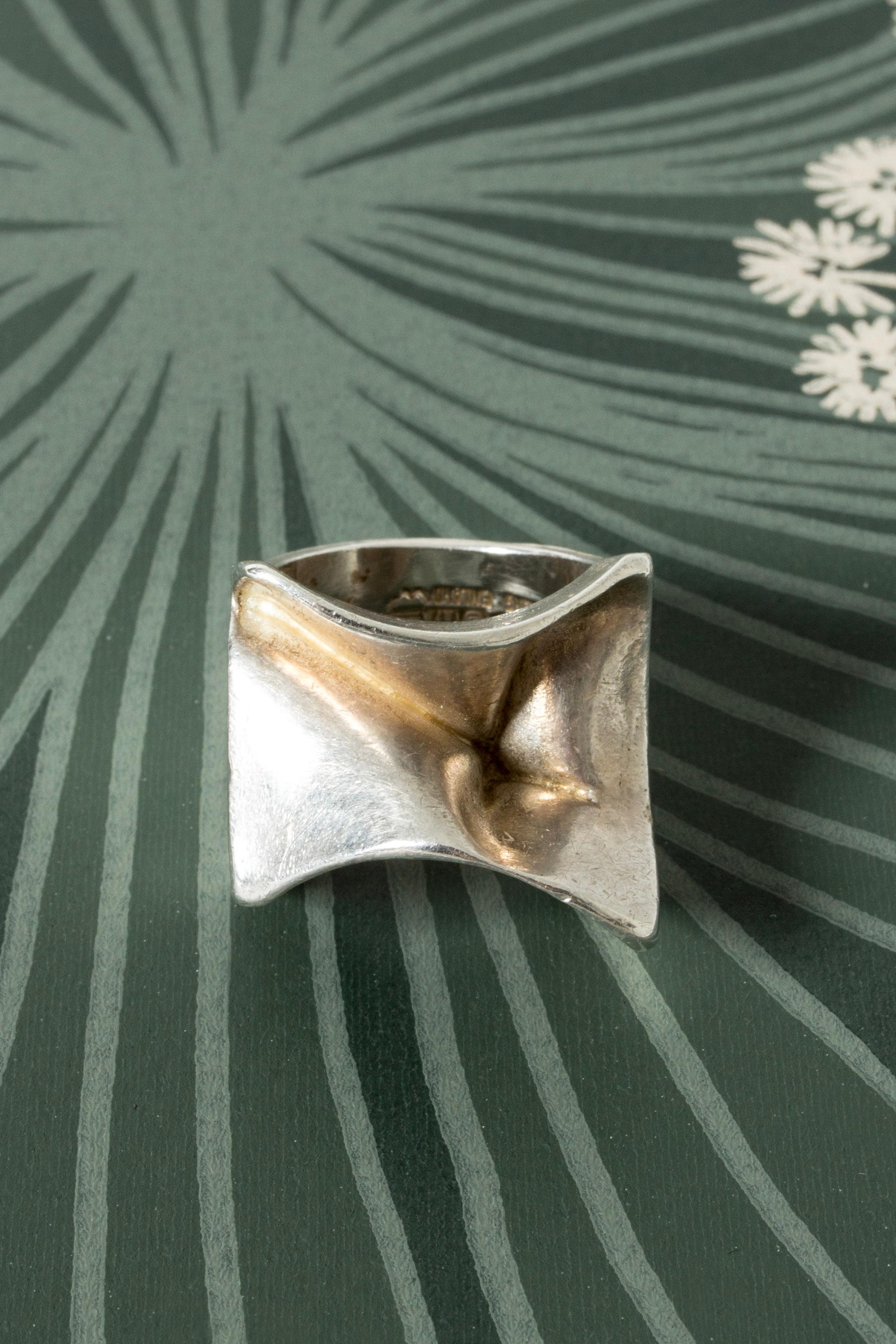 Striking silver ring by Björn Weckström, model called “Carina”. Generous silver folds, looks and feels great on the finger.