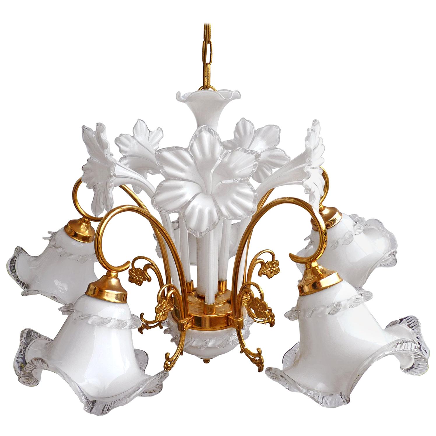 Awesome Italian Murano hand blown art glass chandelier/ Mid-Century Modernist/ vintage, 1970s
Materials: Hand blown glass (white and clear glass) and gold-plated metal
Measures:
Height 36 in =24 in + 20 in/chain (90 cm= 60 cm + 30 cm/