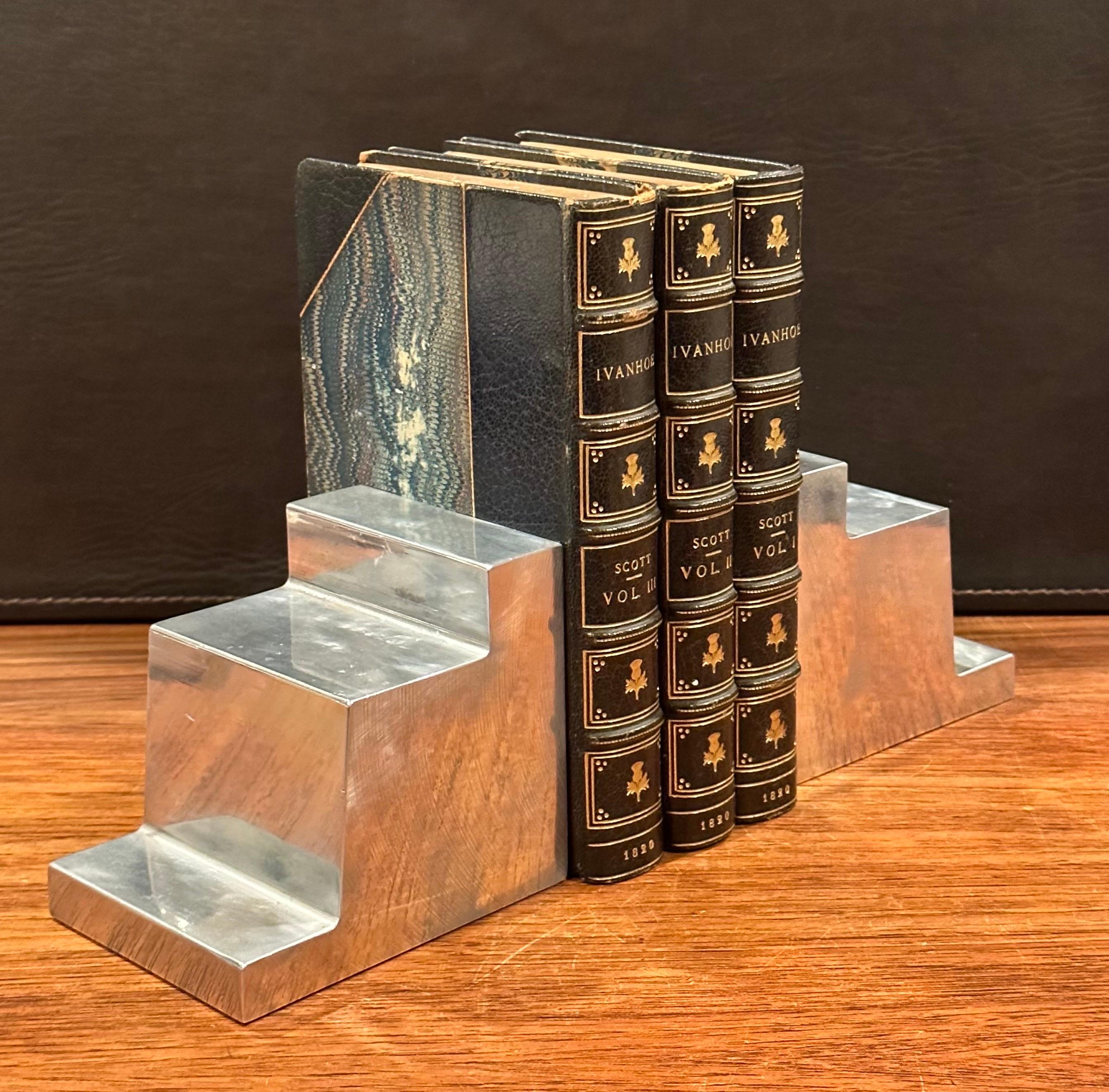 Hand-Crafted Vintage Modernist Stair Cut Polished Steel Bookends For Sale