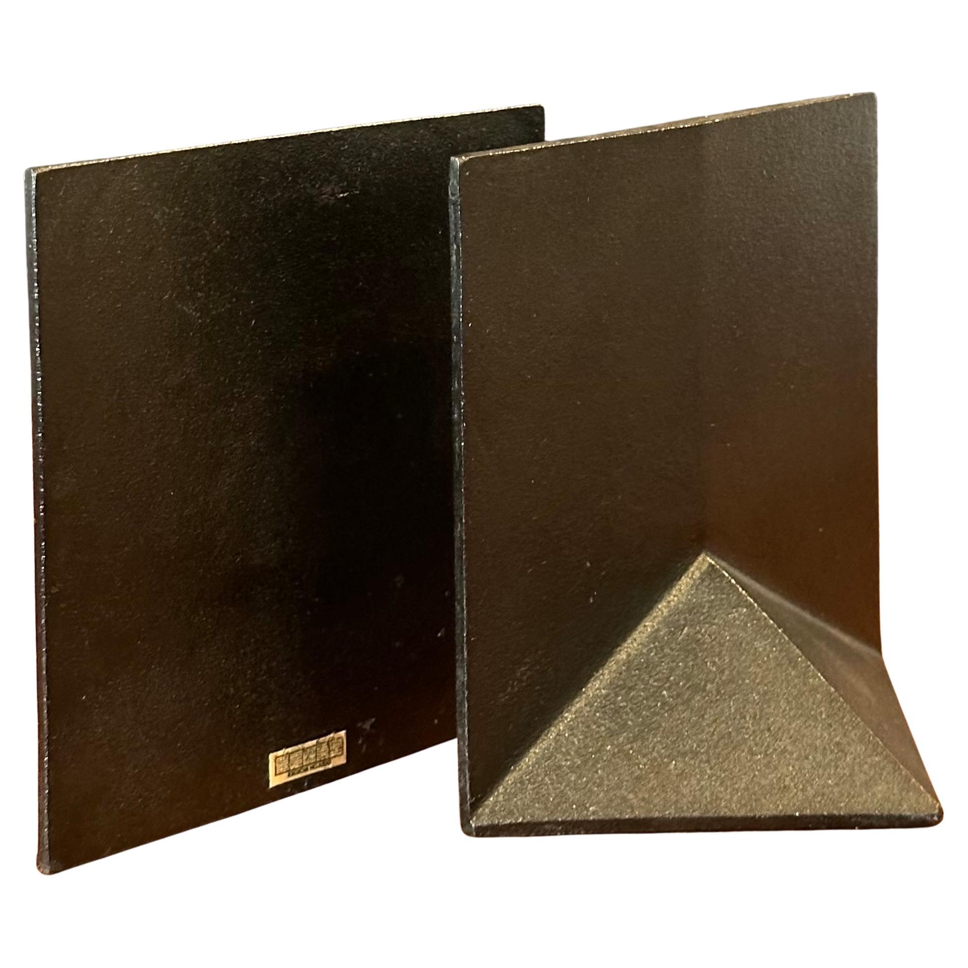 Vintage modernist steel bookends by Kikichi Hojudo of Japan, circa 1970s.  Beautiful and simple with great mid-century minimal lines, the bookends are in very good vintage condition and measure 4.5